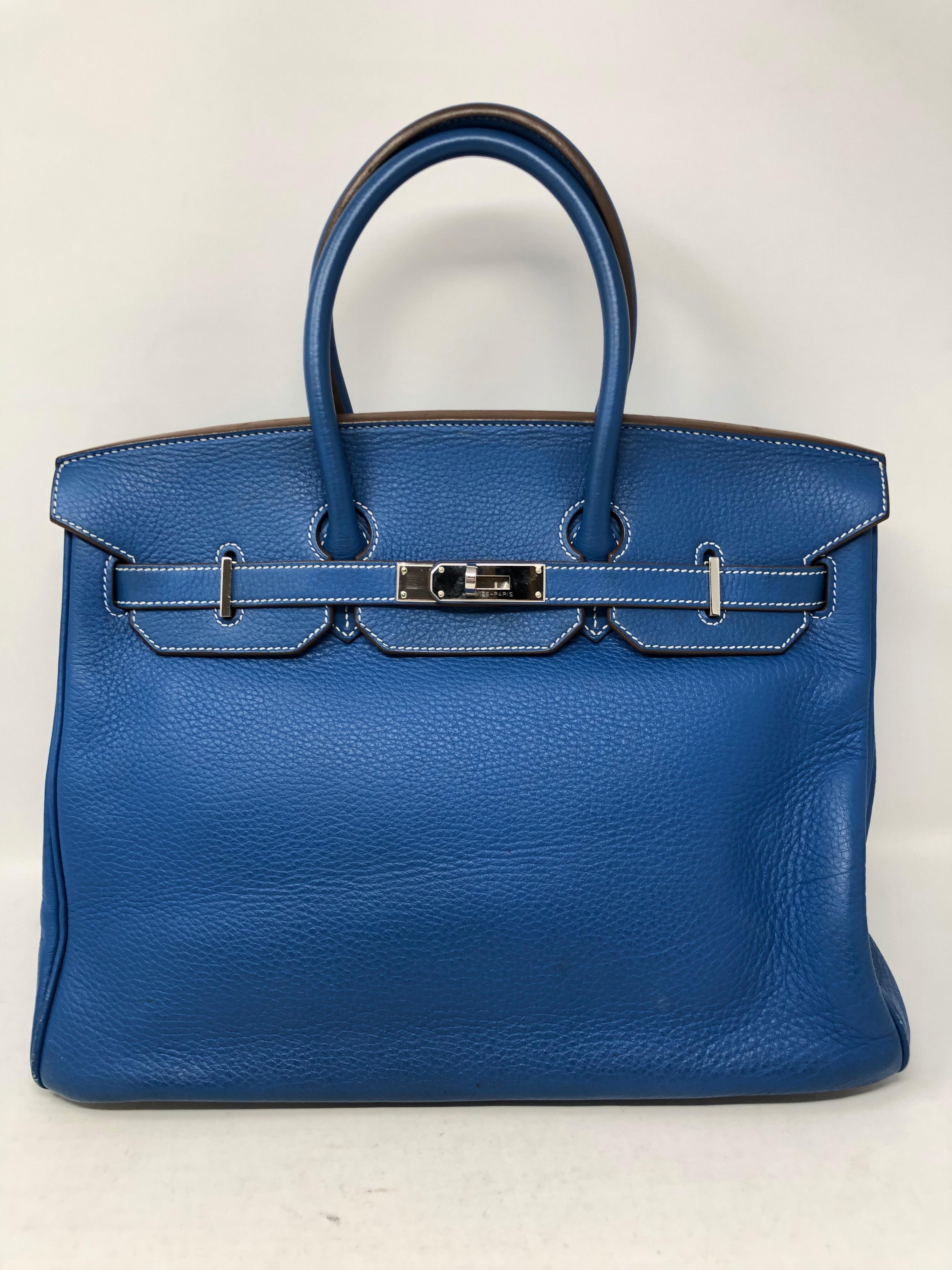 Hermes Birkin Mykonos Blue 35 with White interior and bottom. Bi-color rare Birkin. Winning combination with palladium hardware. From 2011 has some minimal wear on corners as seen in pictures. Inside is clean and handles look hardly worn. Plastic is