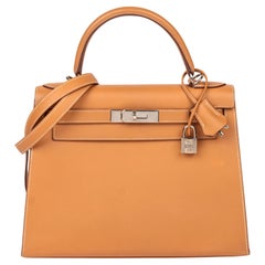 Hermès Kelly en cuir naturel Chamonix 28cm