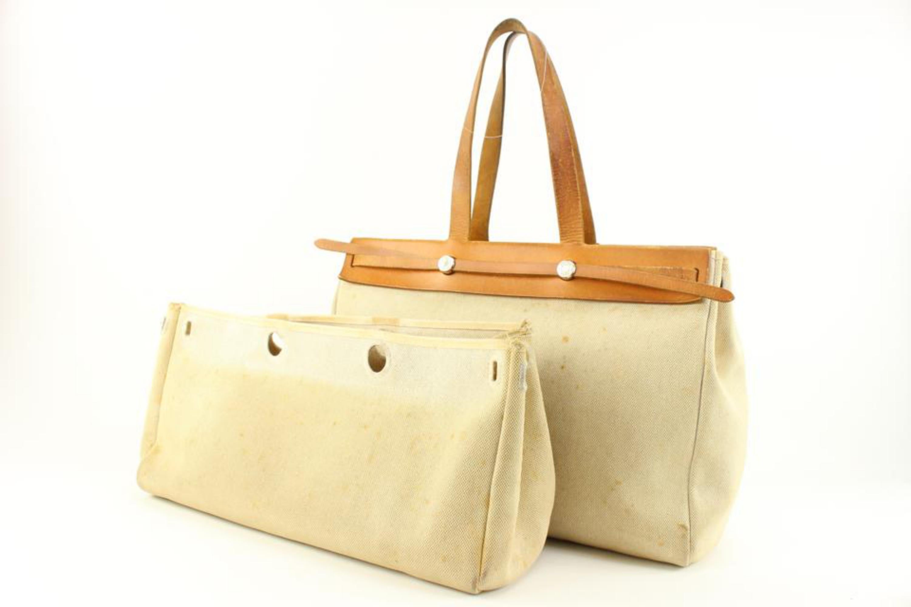 Hermès Natural Toile and Vache Calfskin Leather Herbag Cabas 50 2-in-1 13h52
Date Code/Serial Number: F in a Square
Made In: France
Measurements: Length:  20