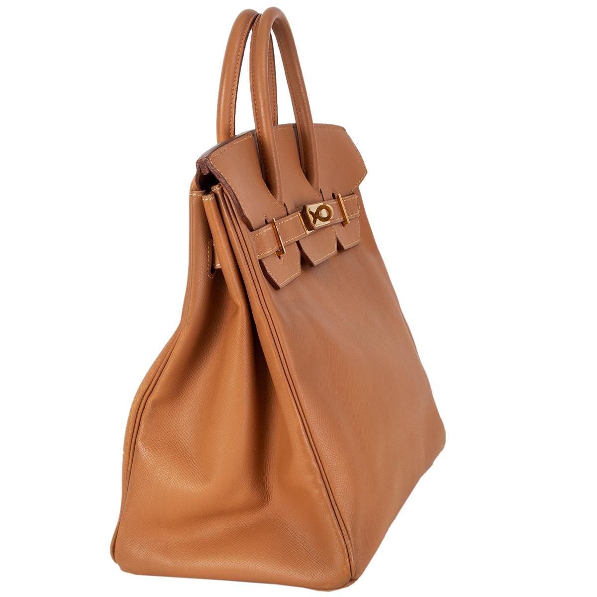 Hermes 'Haut a Courroies 32 HAC' bag in Naturel Veau Epsom leather with gold-plated hardware. Lined in Chevre (goat skin) with an open pocket against the front and a zipper pocket against the back. Has been carried some light wear on the handles and