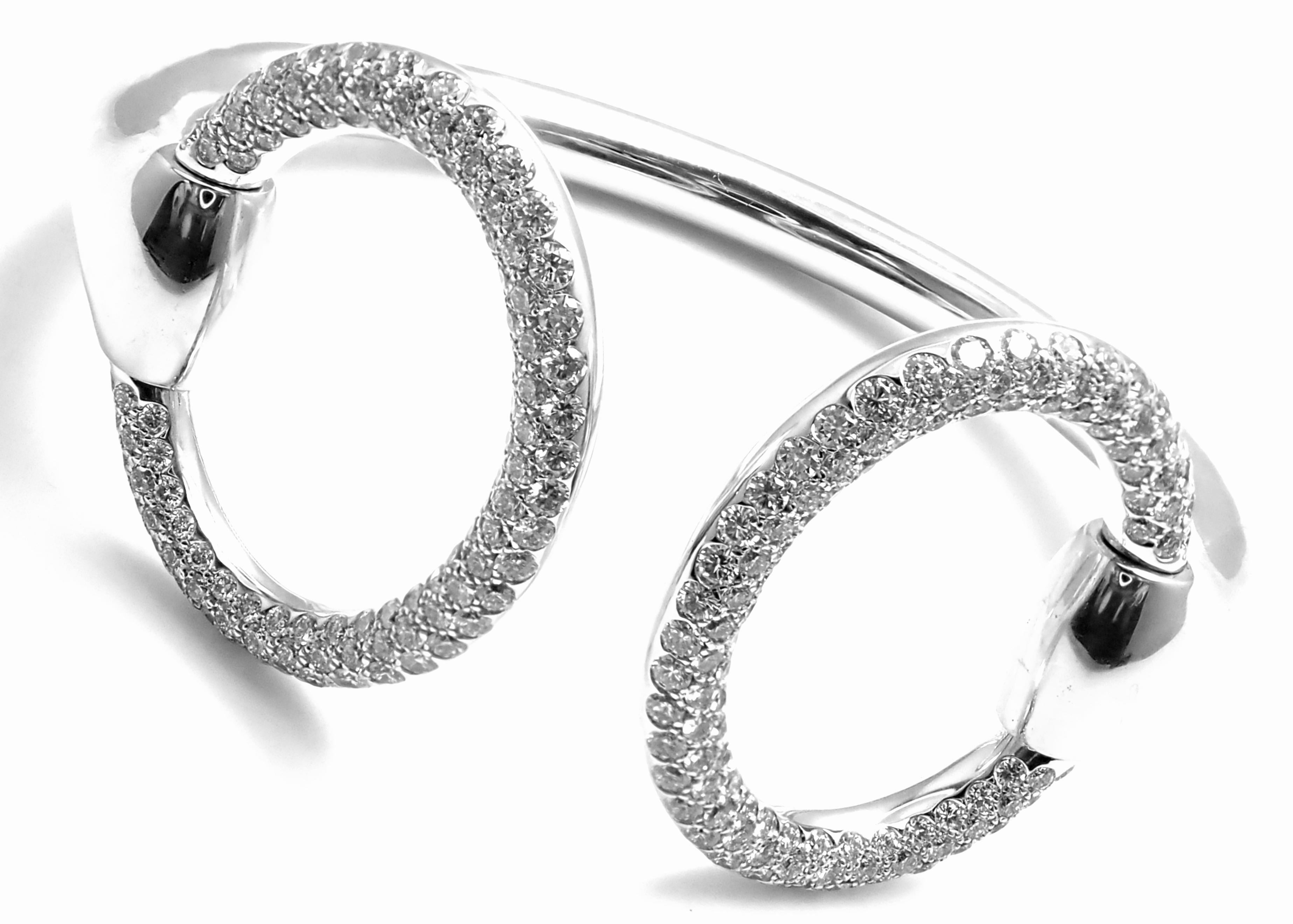Stunning 18k White Gold Diamond Horsebit Nausicaa Cuff Bangle Bracelet by Hermes. 
With Round brilliant cut diamonds VVS1 clarity E color total weight approx. 4ct
Details: 
Length: 6.5