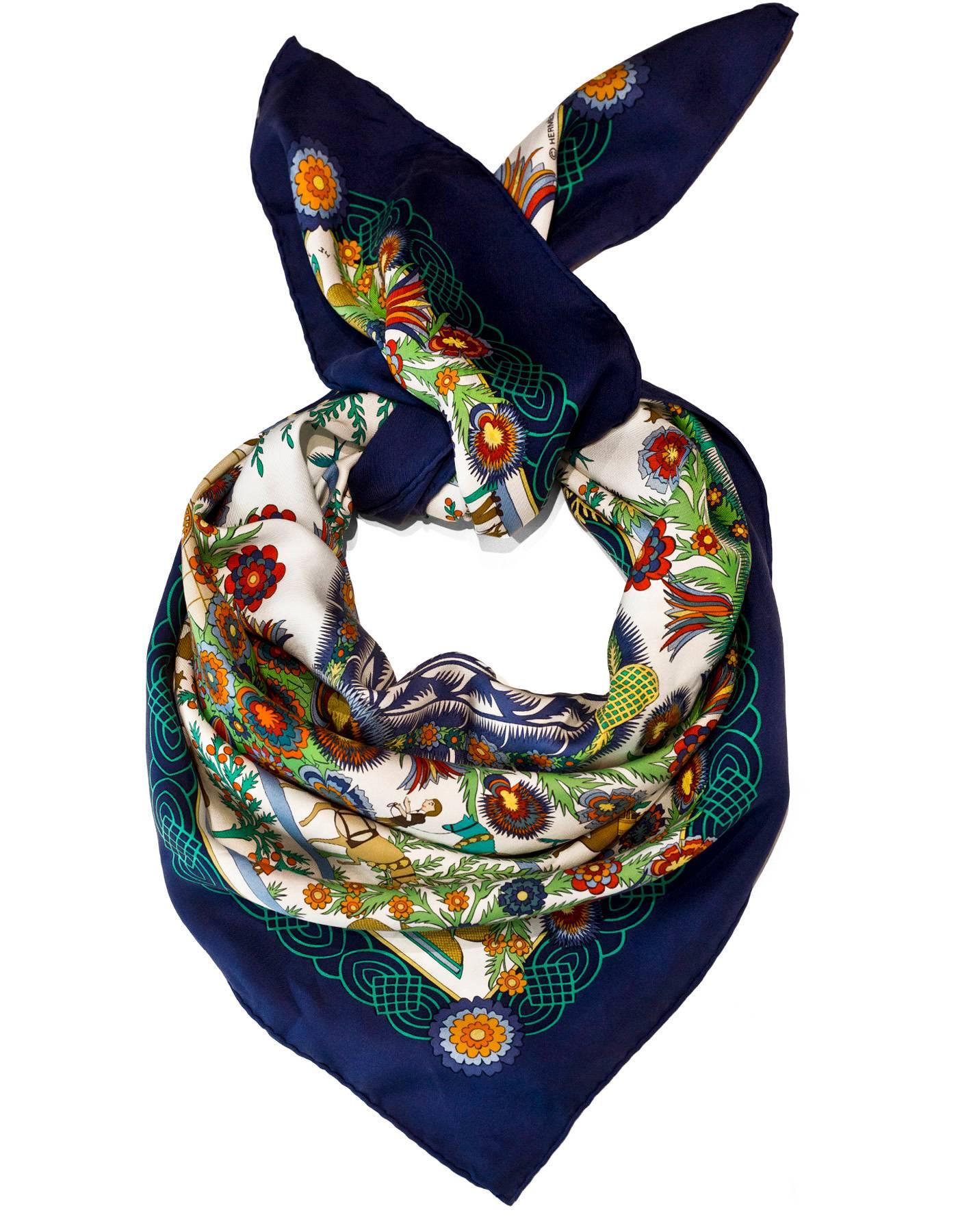 Hermes Navy & Multi-Color Decoupahes Silk 90cm Scarf

Made In: France
Color: Navy, white, red, green
Composition: 100% Silk
Retail Price: $395 + tax
Overall Condition: Excellent pre-owned condition with the exception of some fading and gentle wear