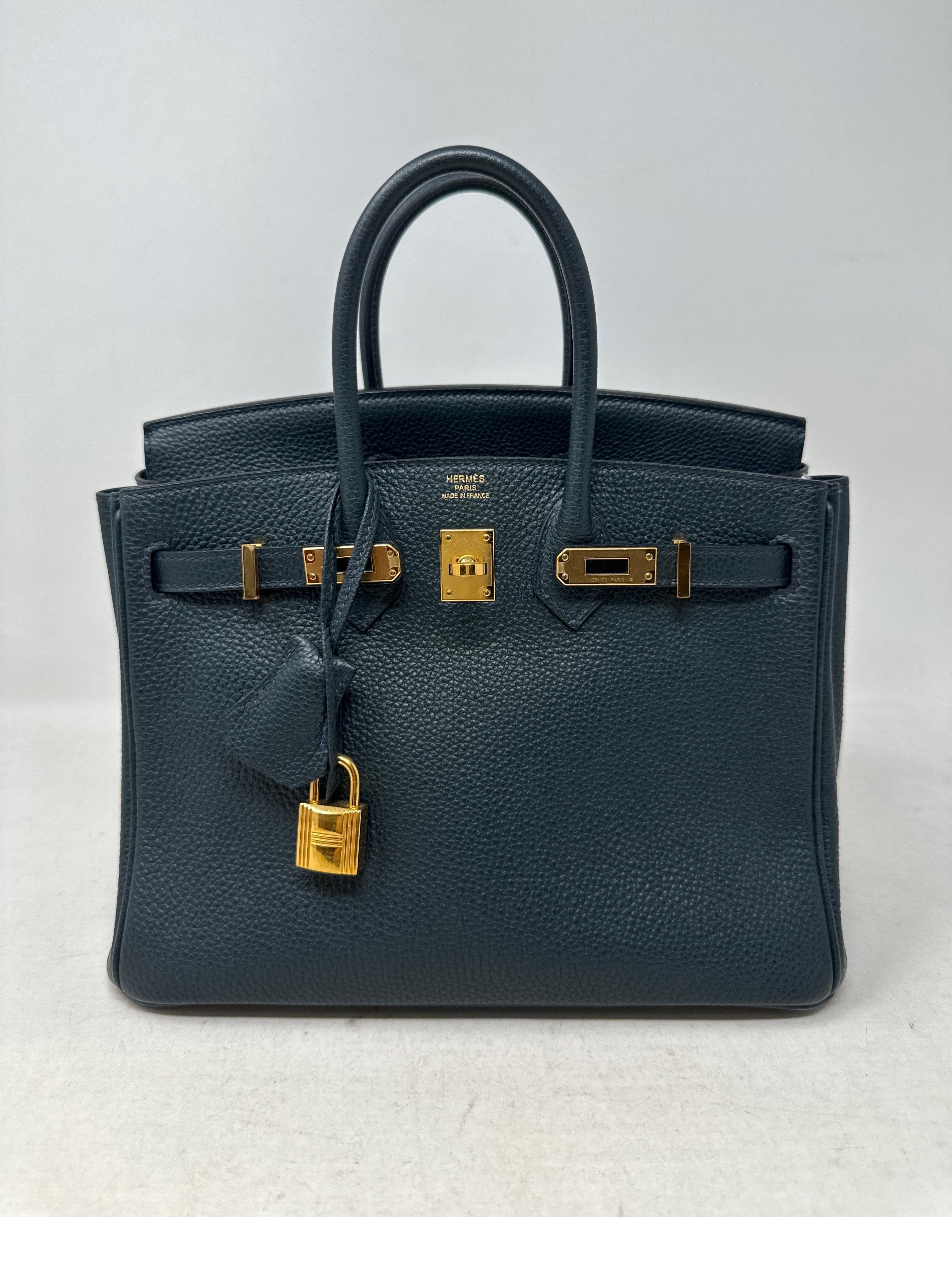 Hermes Navy 25 Birkin Bag. Rare navy color with gold hardware. Good condition. Interior clean. Togo leather. Collector's piece. Includes clochette, lock,  keys, and dust bag. Guaranteed authentic. Don't miss out on this one. 