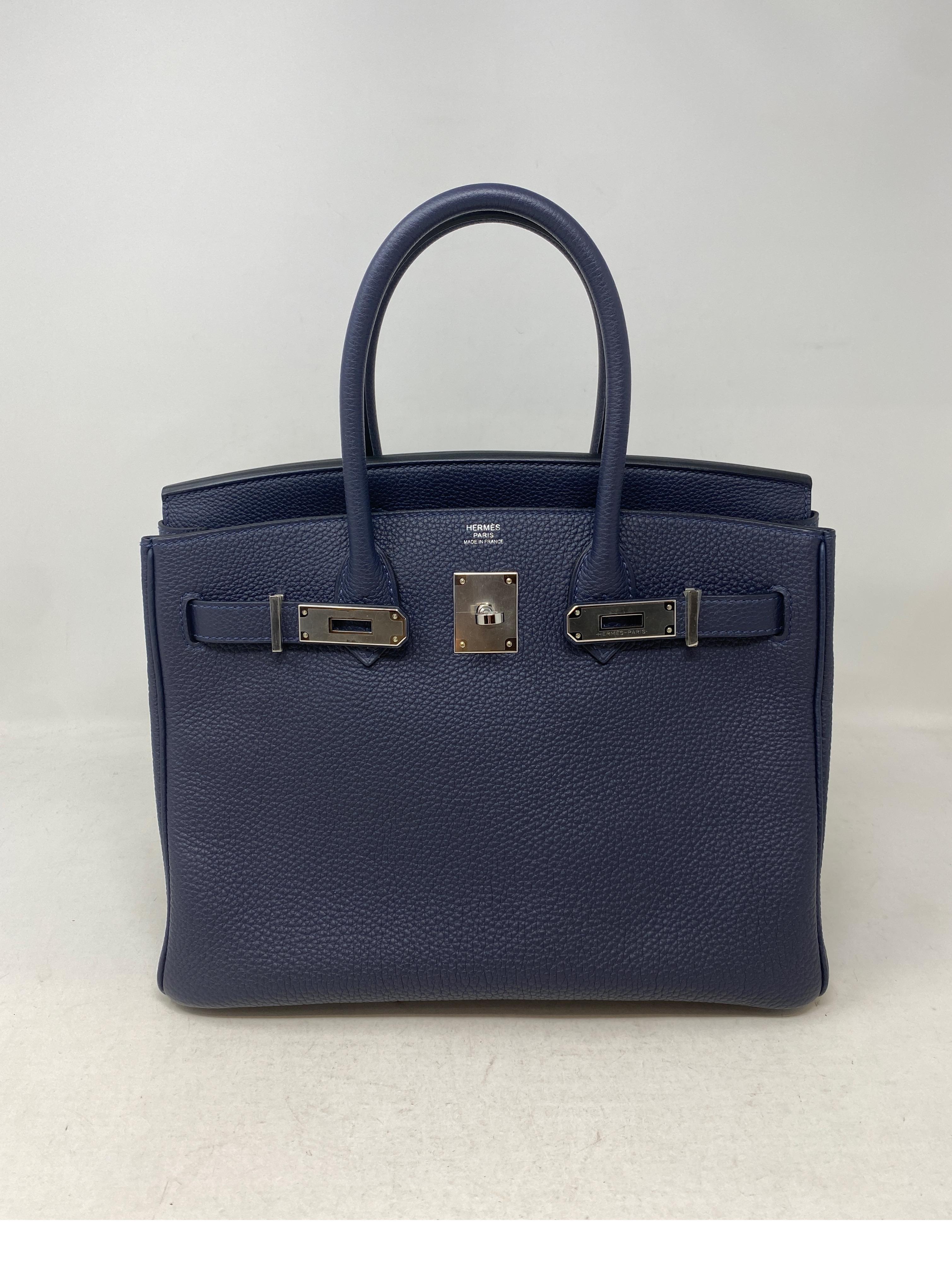 Hermes Navy Birkin 30 Bag. Palladium hardware. Rare navy color. Looks like new. Excellent condition. Gorgeous dark blue Birkin. Most wanted size 30. Interior clean. Includes clochette, lock, keys, and dust bag. Guaranteed authentic. 