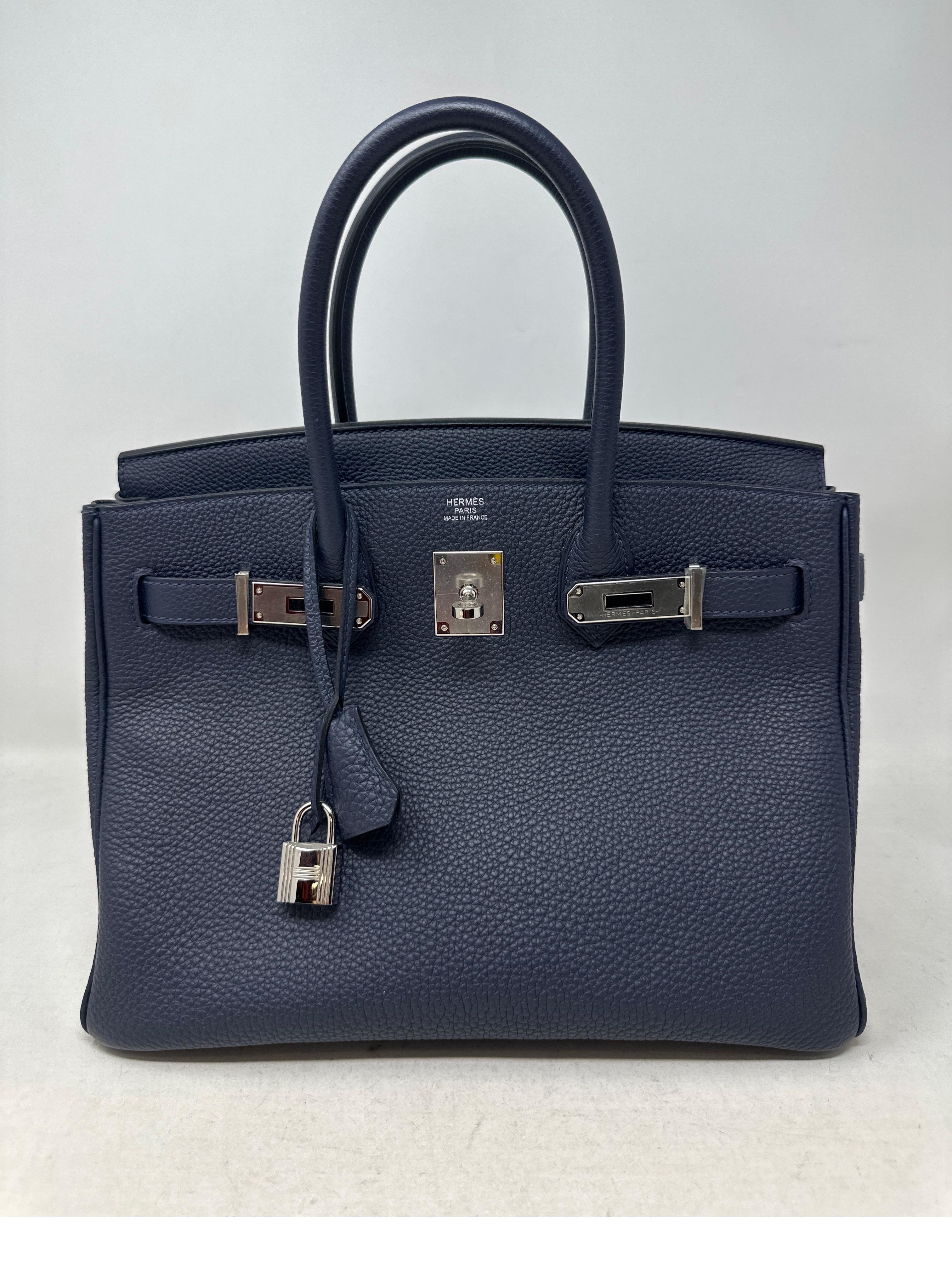 Hermes Navy Birkin 30 Bag. Palladium hardware. Newer bag in brand new condition. Togo leather. Rare navy color. Most wanted size. Includes clochette, lock, keys, and dust bag. Guaranteed authentic. 