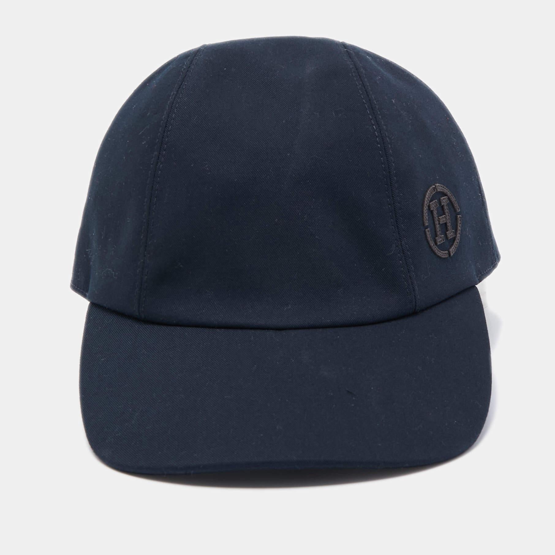 Embrace a casual day with luxurious fashion by adding this designer cap while you step out. Made from quality materials, it comes in a navy blue shade.

Includes: Price Tag