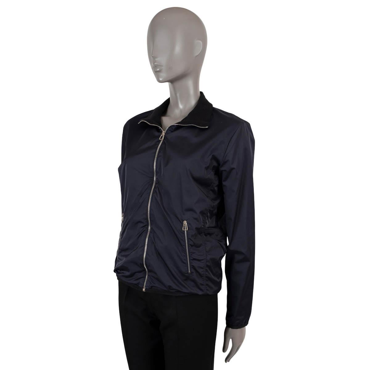 100% authentic Hermès fleece-lined Windbreaker jacket in navy polyamide (100%). Features two zipper pockets on the front. Closes with a silver zipper on the front and is lined in fleece polyerster (with 8% elastane). Has been worn and is in