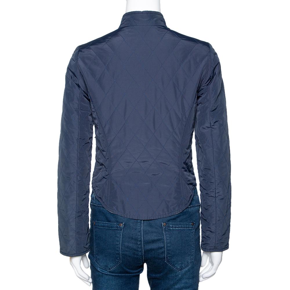 Tailored to perfection is this exclusive and classy jacket from the house of Hermes. Navy blue in color, this would take your style game to a whole new level. It is designed in a simple & sleek style with a zip closure on the front, a quilted