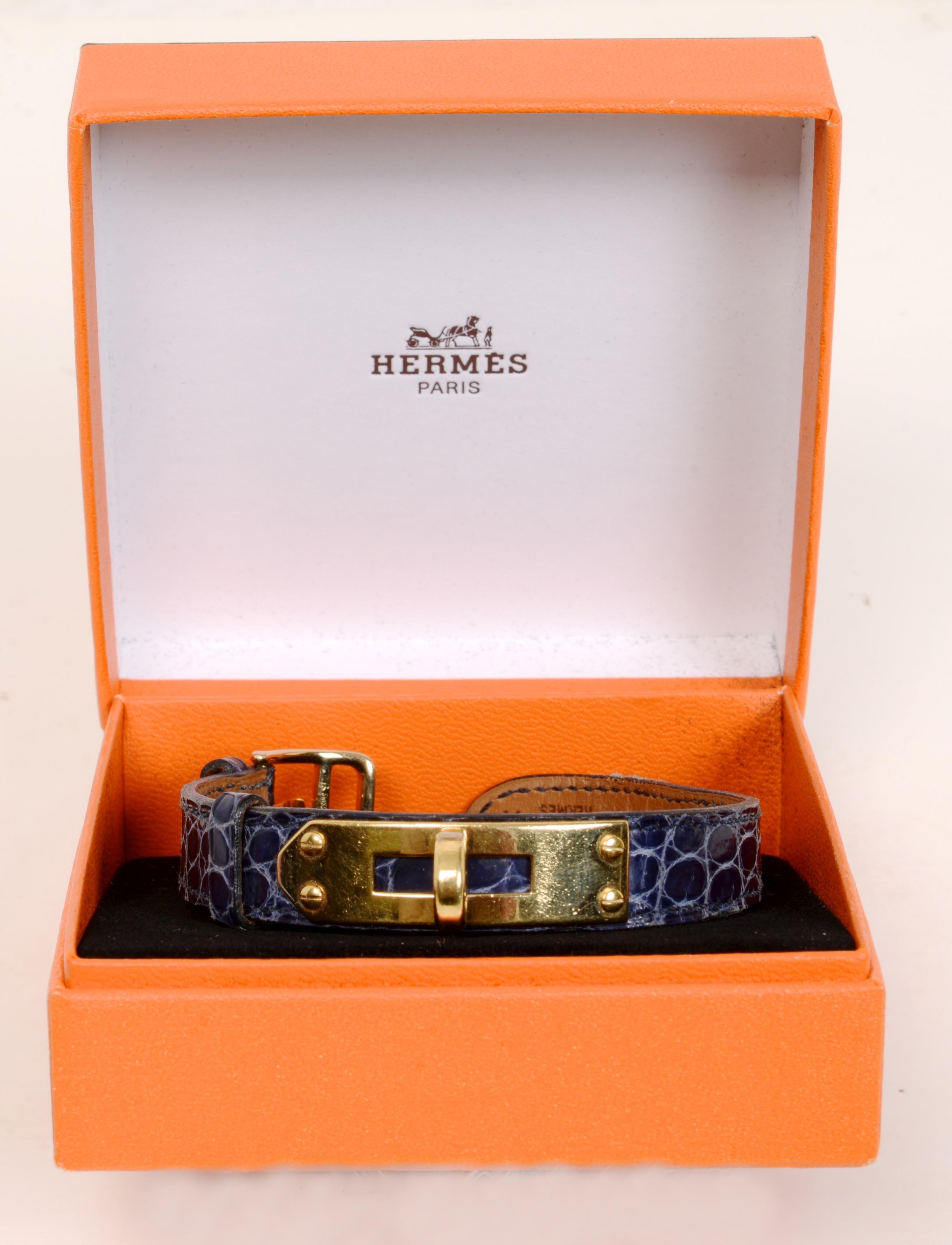 A Hermès watchband for the Kelly watch with 18K gold plated hardware and navy Hermès crocodile band. Stamped: Hermès, Swiss Placque D.
Trent Antiques has been a respected name in antiques for over 35 years with a large collection of period