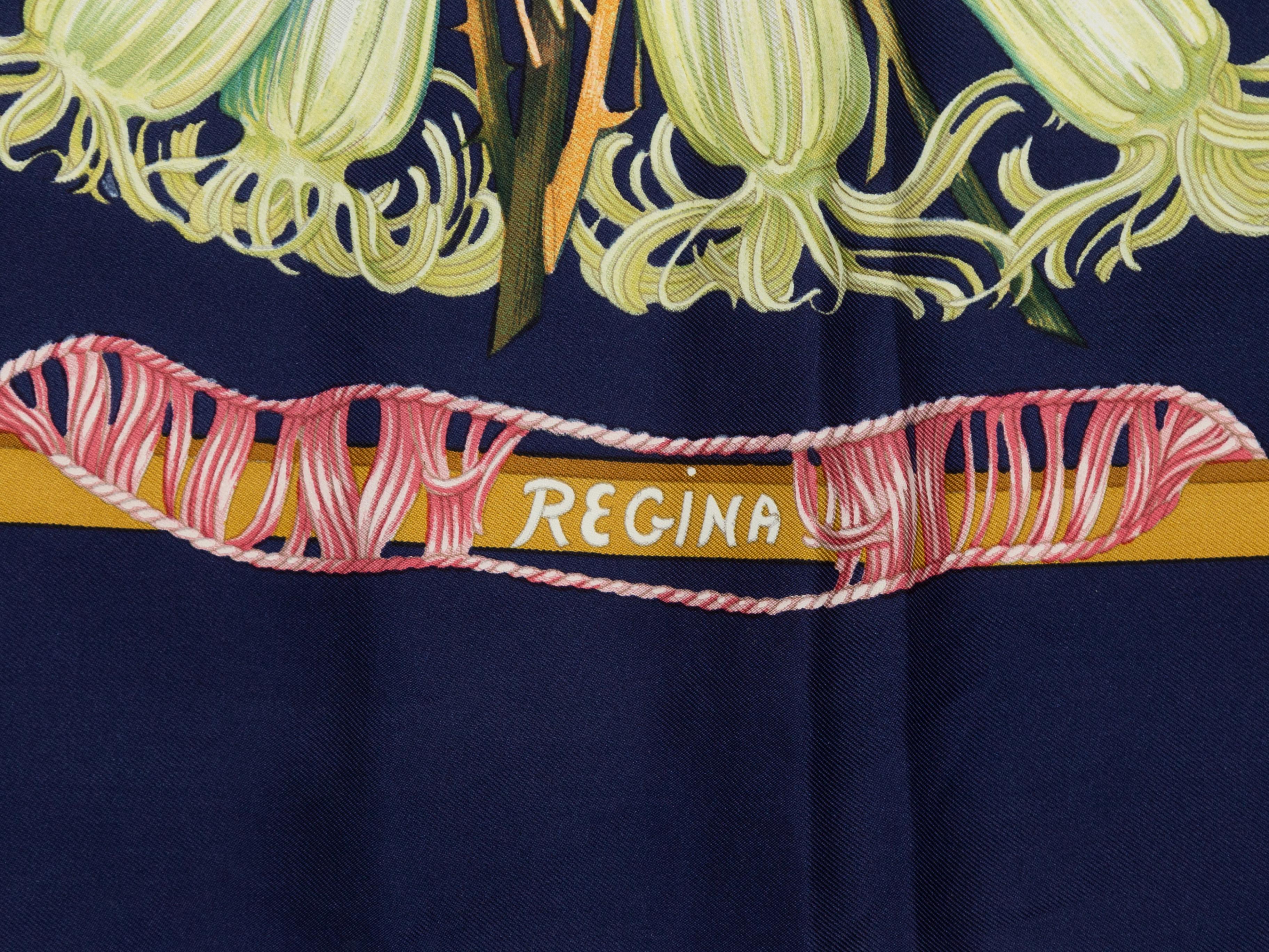 Product details: Navy and multicolor 'Regina' silk scarf by Hermes. Floral print throughout. 35