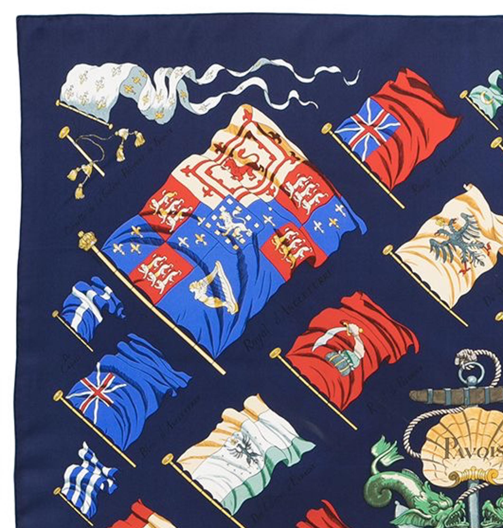 Navy silk scarf Pavois by Ledoux from Hermès Pre-Owned featuring multicolor flags pattern. 
Circa 1990s
In excellent vintage condition. Made in France.
35,4in. (90cm)  X 35,4in. (90cm)
We guarantee you will receive this  iconic item as described and