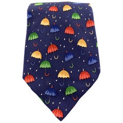 HERMES Cravate en soie imprimée parapluie marine