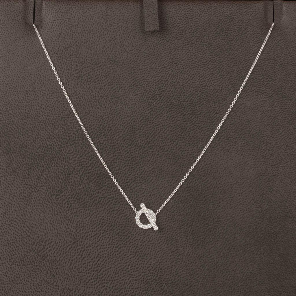 Guaranteed authentic Hermes 18k white gold diamond IO Finesse pendant necklace.
19 Brilliant cut VS1 clarity 0.54ct diamonds.
Chic and elegant and easily worn day to evening.
Signature stamps on rear.
Comes with black gift box signature Hermes