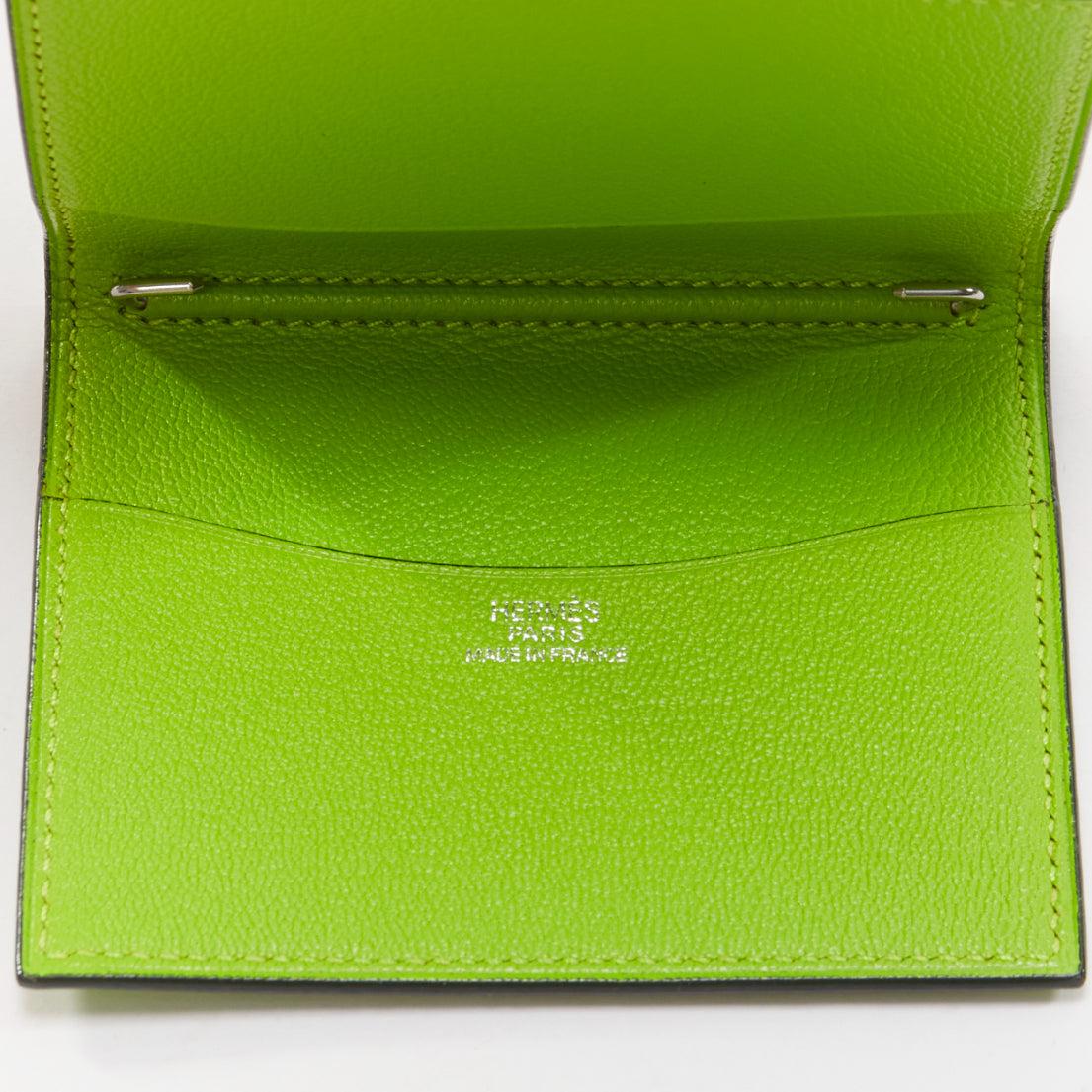 HERMES neon green smooth leather silver hardware bifold cardholder
Reference: AAWC/A00988
Brand: Hermes
Material: Leather
Color: Green
Pattern: Solid
Lining: Green Leather
Made in: France

CONDITION:
Condition: Excellent, this item was pre-owned and