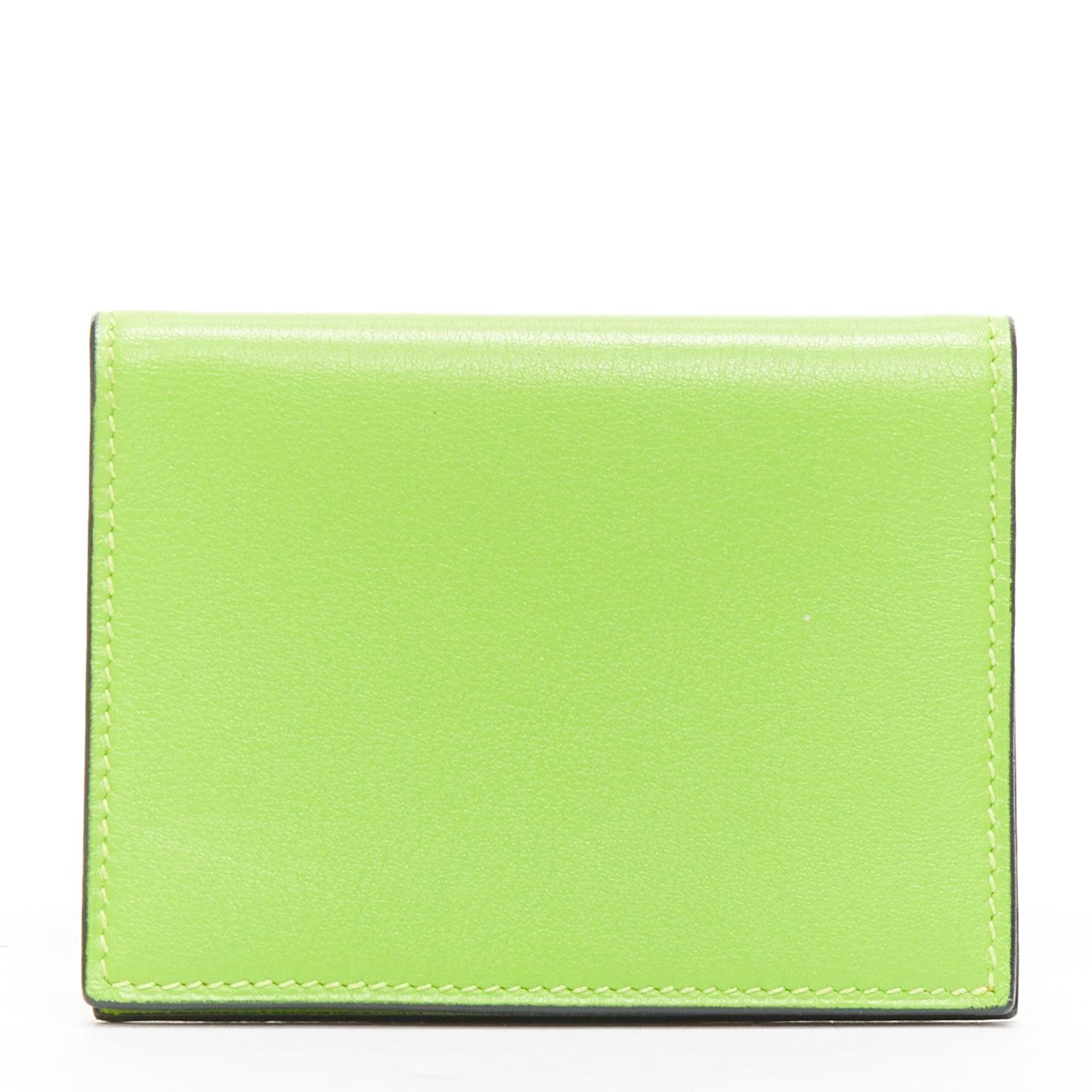 Green HERMES neon green smooth leather silver hardware bifold cardholder For Sale