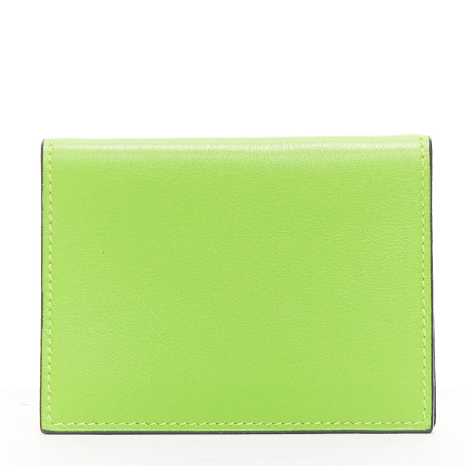 Women's HERMES neon green smooth leather silver hardware bifold cardholder For Sale