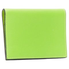 HERMES neon green smooth leather silver hardware bifold cardholder