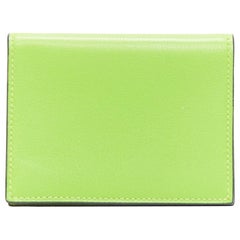 HERMES neon green smooth leather silver hardware bifold cardholder