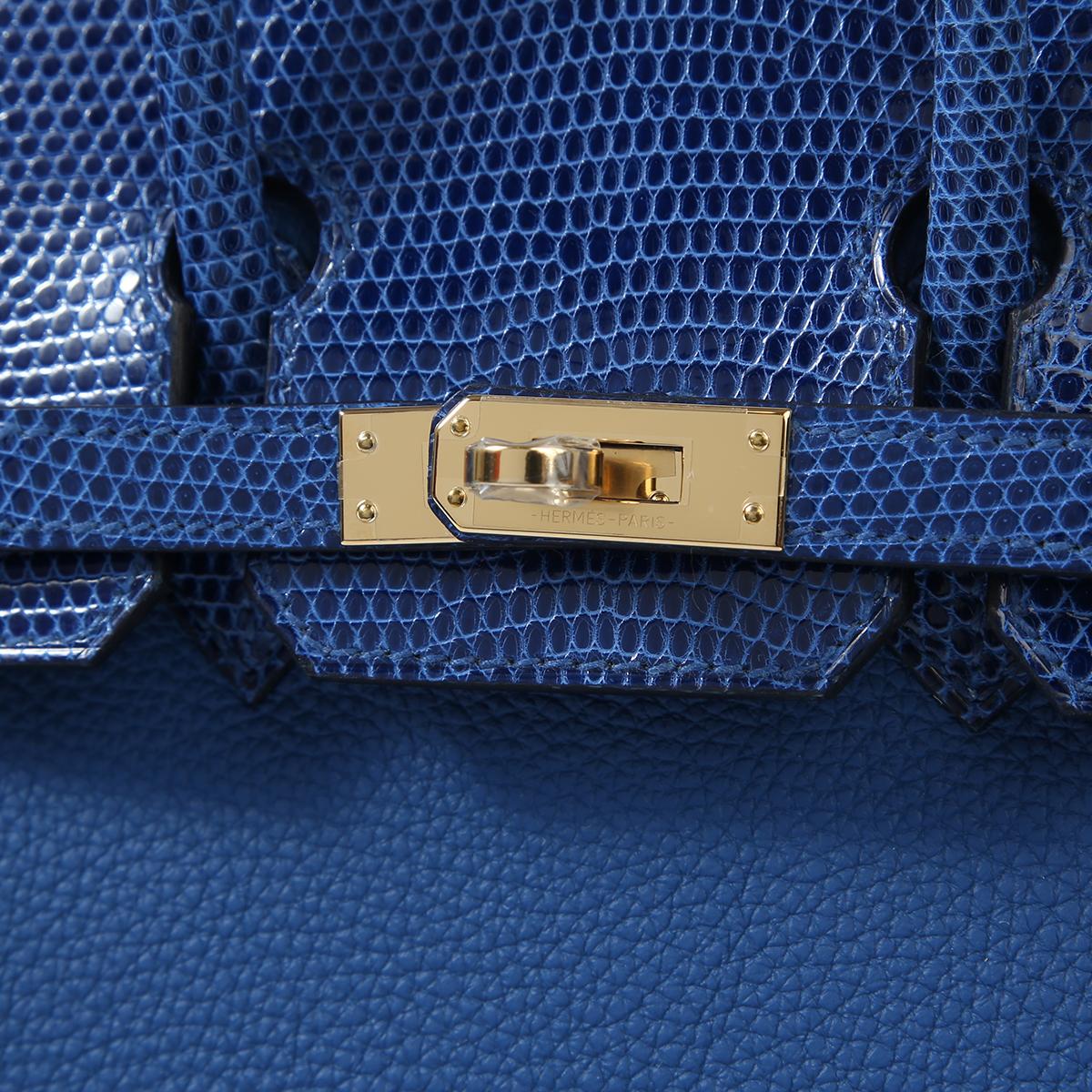 New Condition
From 2022 Collection
Bleu Royal 
Lizard
Togo
Permabrass Hardware
Includes  Padlock, Clochette, Rain Cover, Dustbag, Box, Keys
Measures 9.85