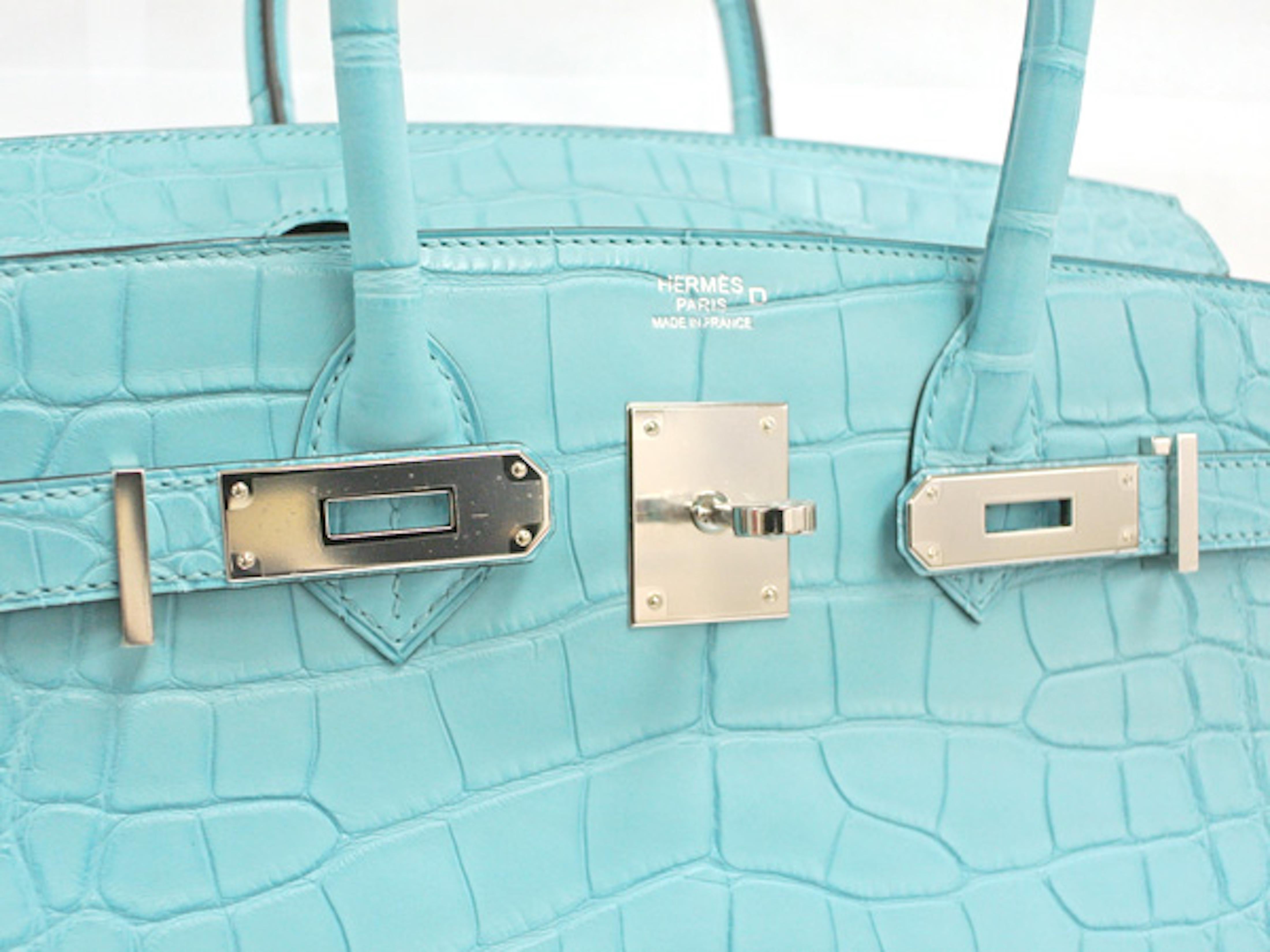 Your Exclusive Exotic Hermes Birkin Has Arrived.  

Combining beautiful baby blue matte alligator skin, this brand new Hermes Birkin 30 is a special treat and rare find unlike any other out of the French fashion house. Featuring stunning palladium