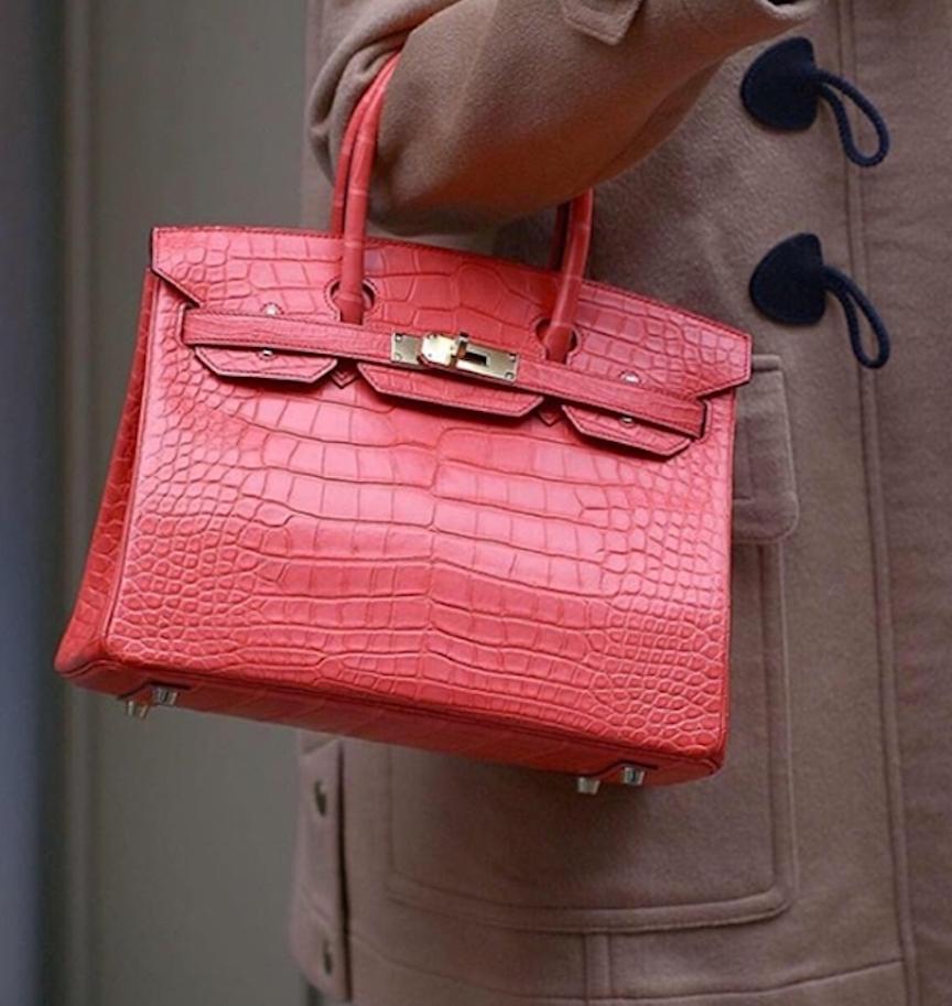 Your Exclusive Exotic Hermes Birkin Has Arrived.  

Combining beautiful rose pink matte alligator skin, this brand new Hermes Birkin 30 is a special treat and rare find unlike any other out of the French fashion house. Featuring stunning gold