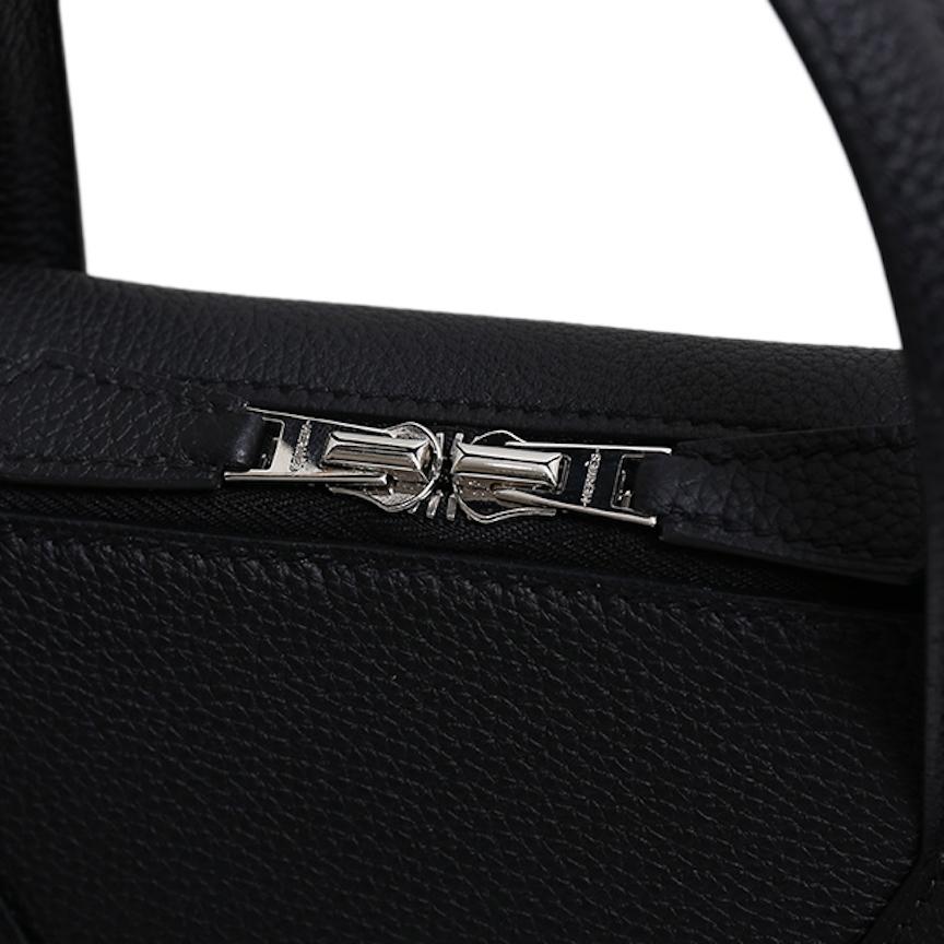 The Hermes Business Bag is Sophistication at its Finest.

Exemplifying elegance, prestige and sophistication, this Hermes business bag is crafted of black Togo leather accented with palladium silver hardware. Brand new and in pristine condition, it