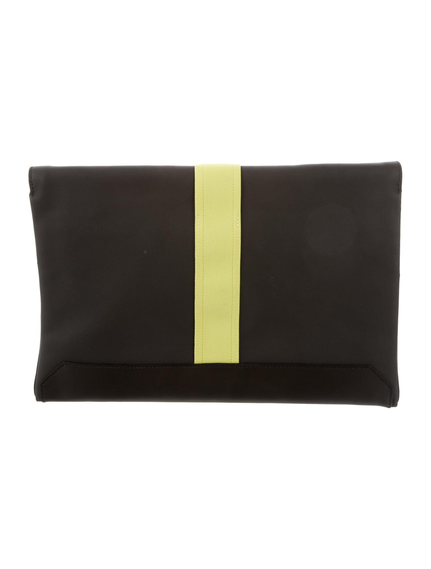 Hermes NEW Black Leather Neon Palladium Evening Envelope Clutch Flap Bag 

Leather 
Nylon
Palladium-plated hardware
Nylon lining
Hook-and-eye closure
Date code present
Made in France
Measures 13