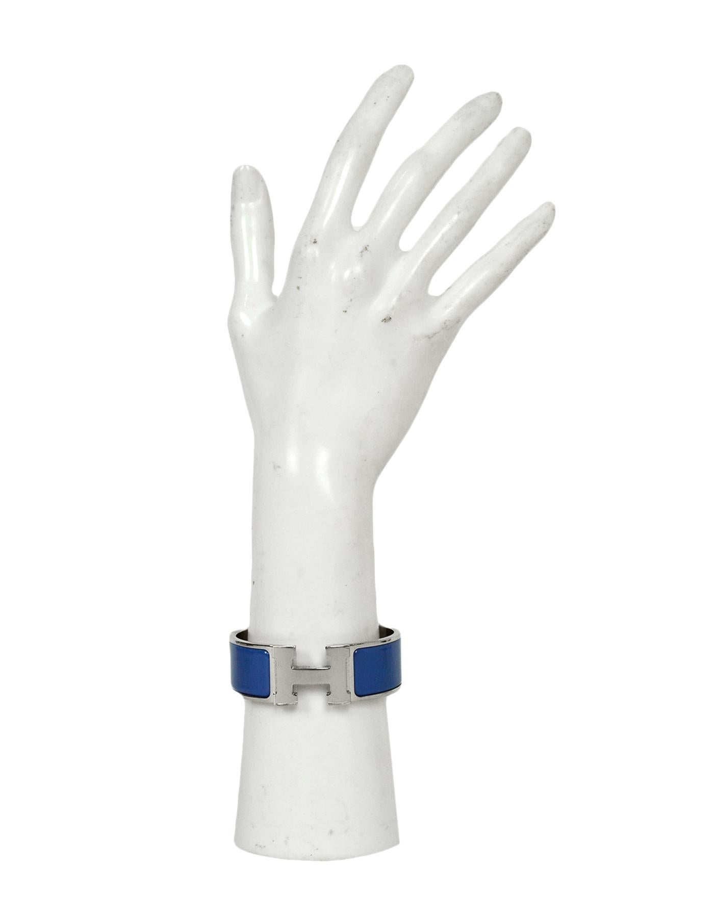 Hermes New Bleu Turquin/Palladium Wide Enamel H Clic Clac Bracelet

Color: Denim blue and silvertone
Materials: Enamel, palladium plated metal
Closure/Opening: Swivel H
Overall Condition: Like new pre-owned condition, protective plastic still on H. 