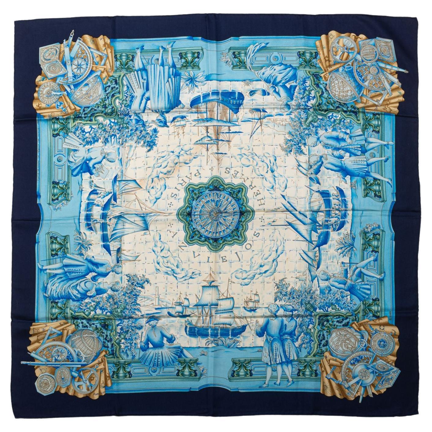 Hermès new collectible black and blue "Baobab" silk scarf. Hand-rolled edges.