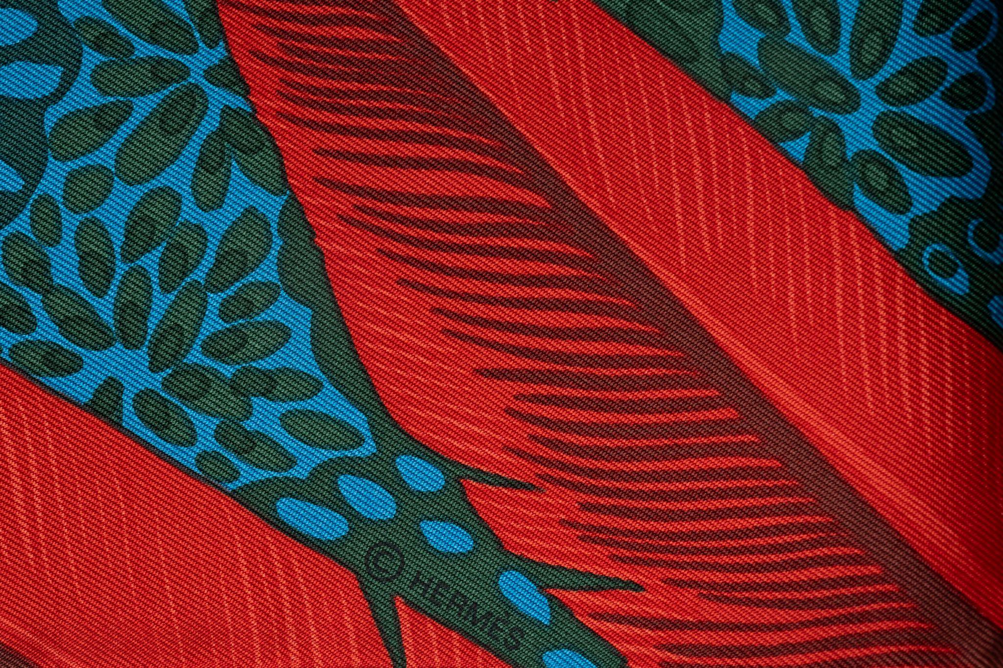 This Hermes new scarf L’Esprit de la Foret 90 cm silk purple carre', forest butterfly design, features hand-rolled edges.