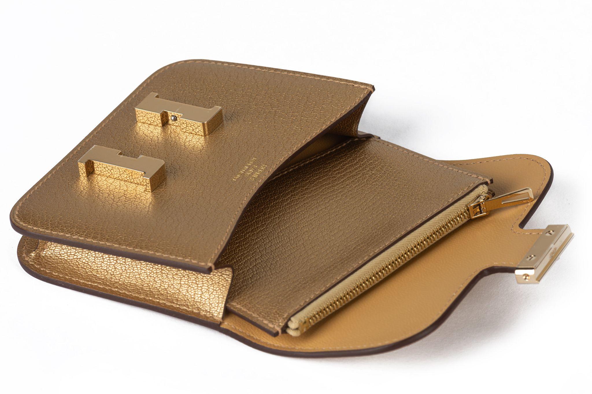 Portafoglio Hermès New Gold Costance Slim in vendita 1