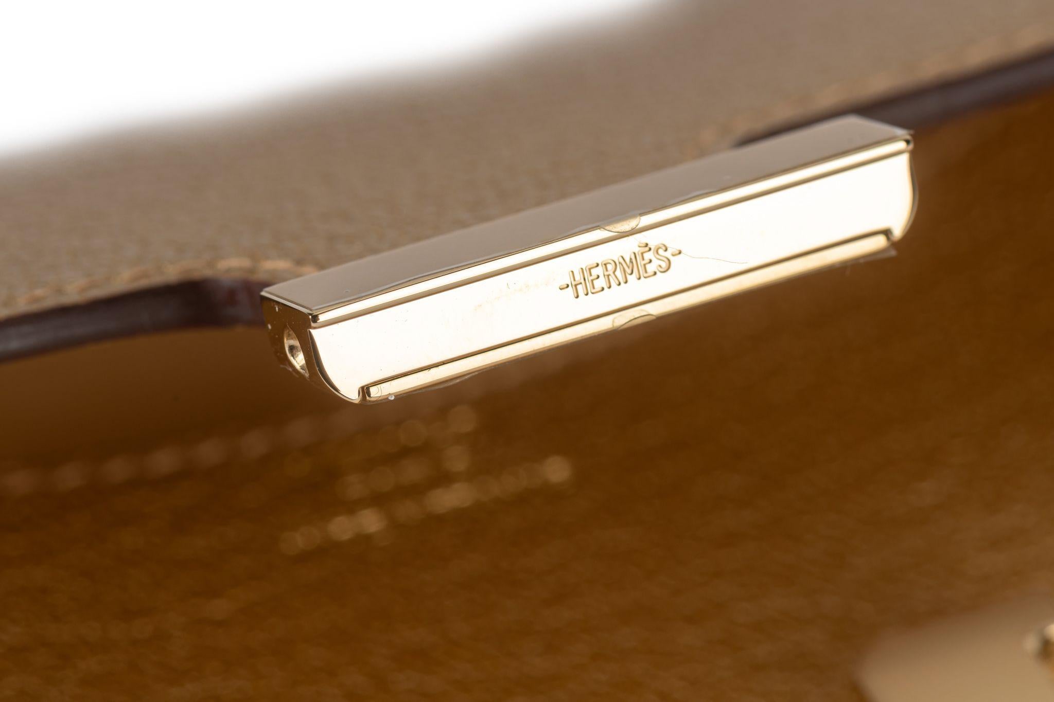 Portafoglio Hermès New Gold Costance Slim in vendita 2