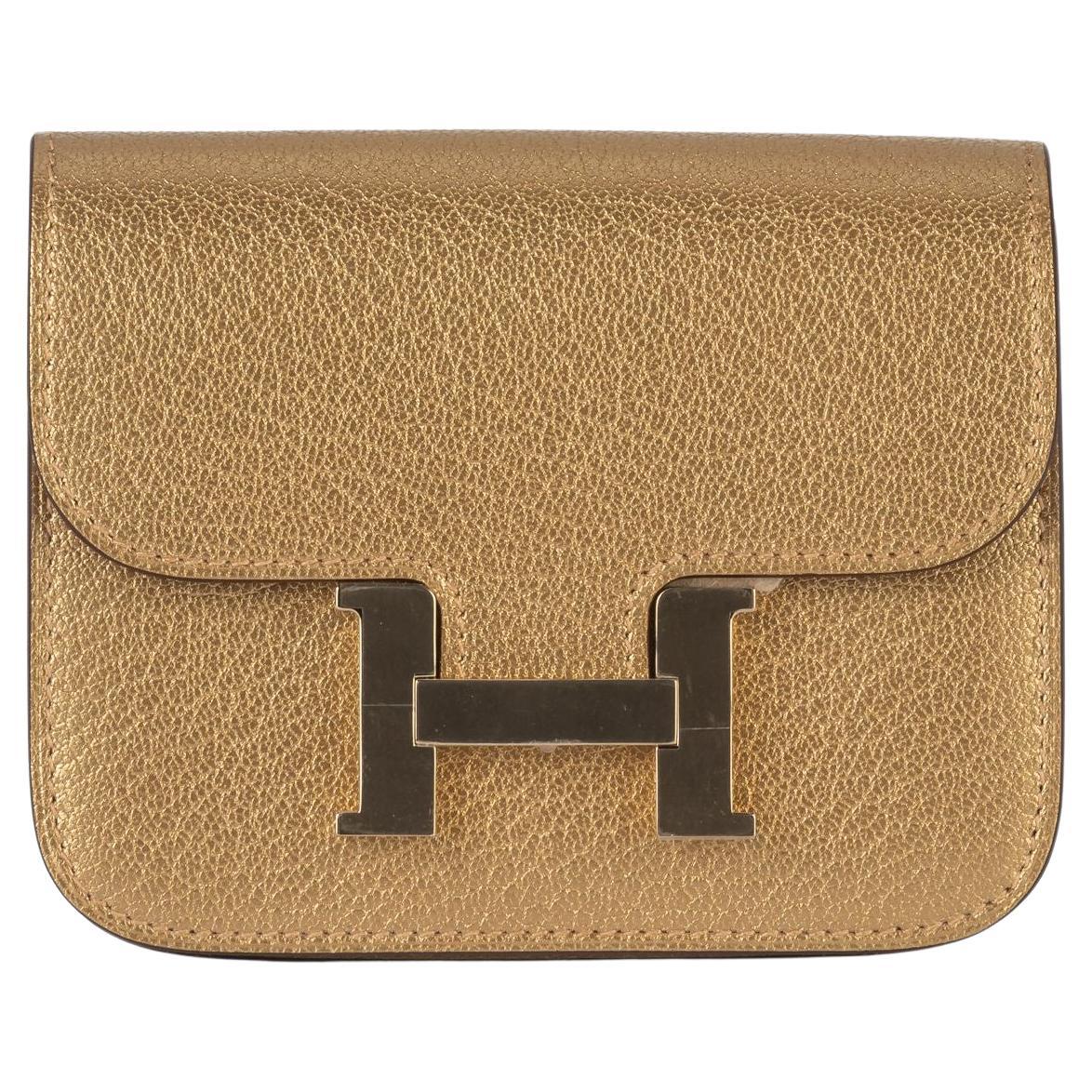 Portafoglio Hermès New Gold Costance Slim in vendita