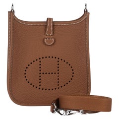 Hermès New Gold Mini Evelyne Bag