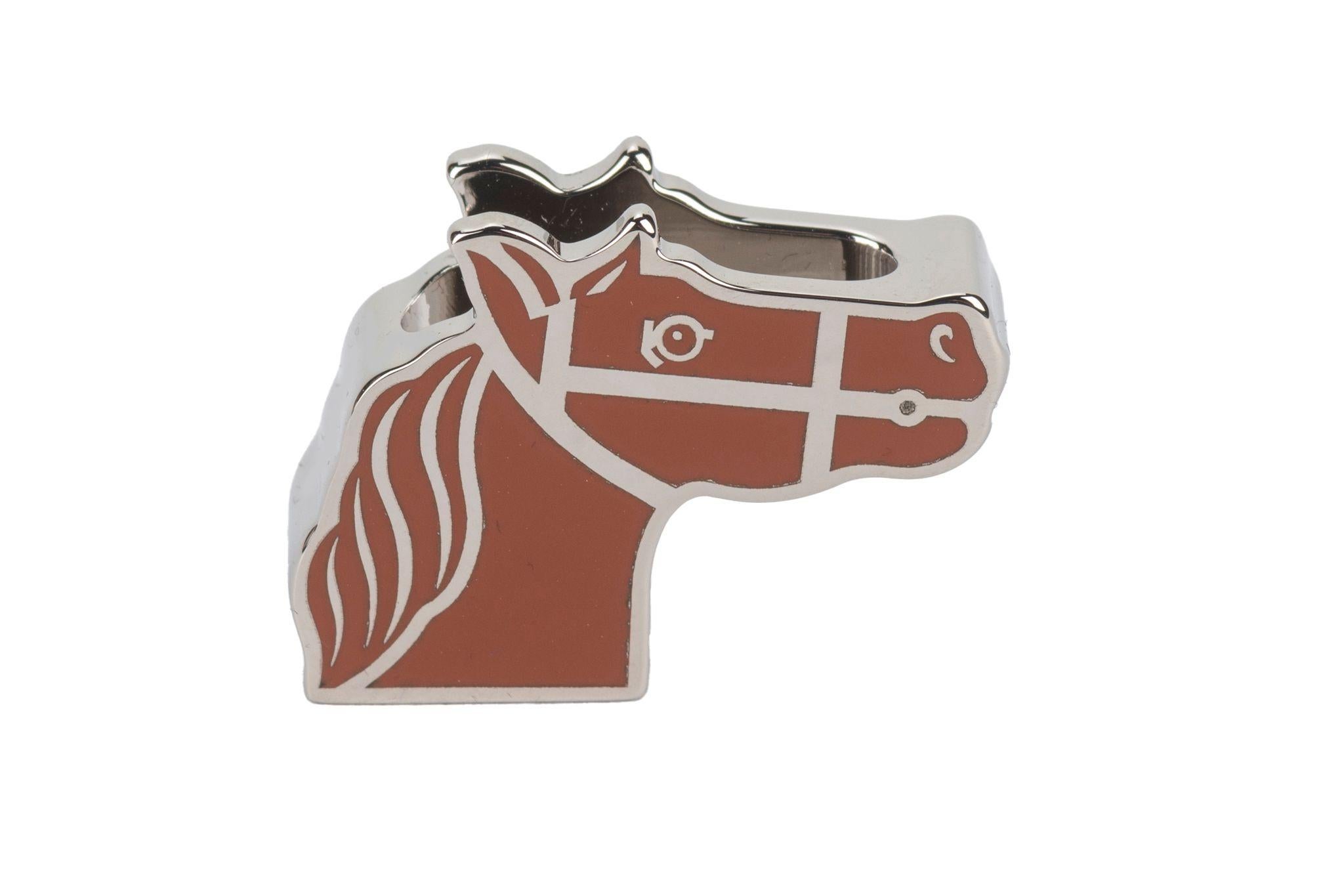 Hermès new twilly ring in lacquered palladium -plated brass.
Palladium and fauve combination. 
Comes with original dustcover and original box. Scarf not included.