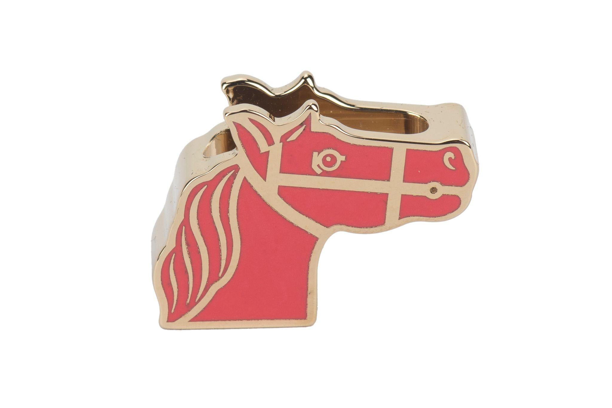 Hermès new twilly ring in lacquered palladium -plated brass.
Gold and rose combination. 
Comes with original dustcover and original box. Scarf not included.