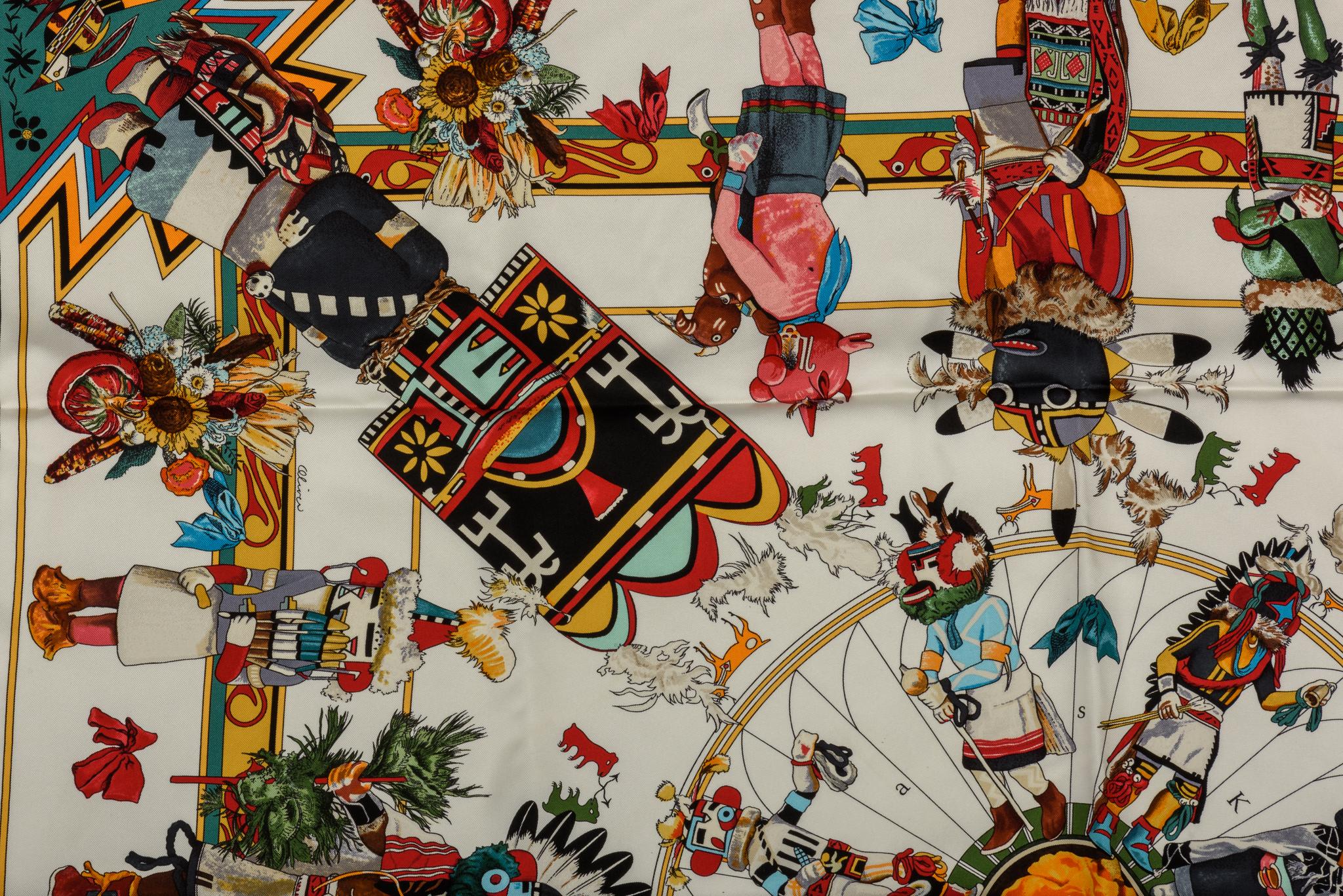 Hermes Kachinas coveted print scarf by Us artist Kermit Oliver. Great condition, hand rolled edges. New in original box , includes ribbon. 