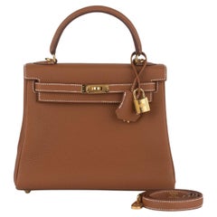 Hermès  New Kelly 25 Retournè Gold Togo