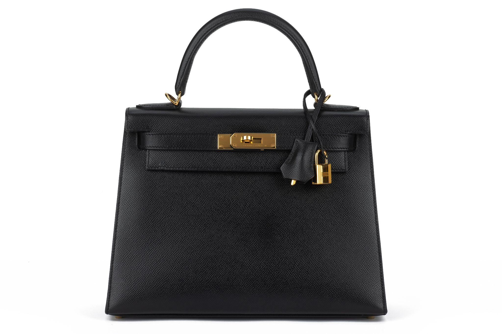 Brand new in box Hermes Kelly Bag 28 sellier black epsom leather with gold tone hardware. Date stamp A for 2017. Unused condition, plastic on hardware.
Comes with : 2 keys , lock, clochette , tirette, rain protection, original dustcover and box.