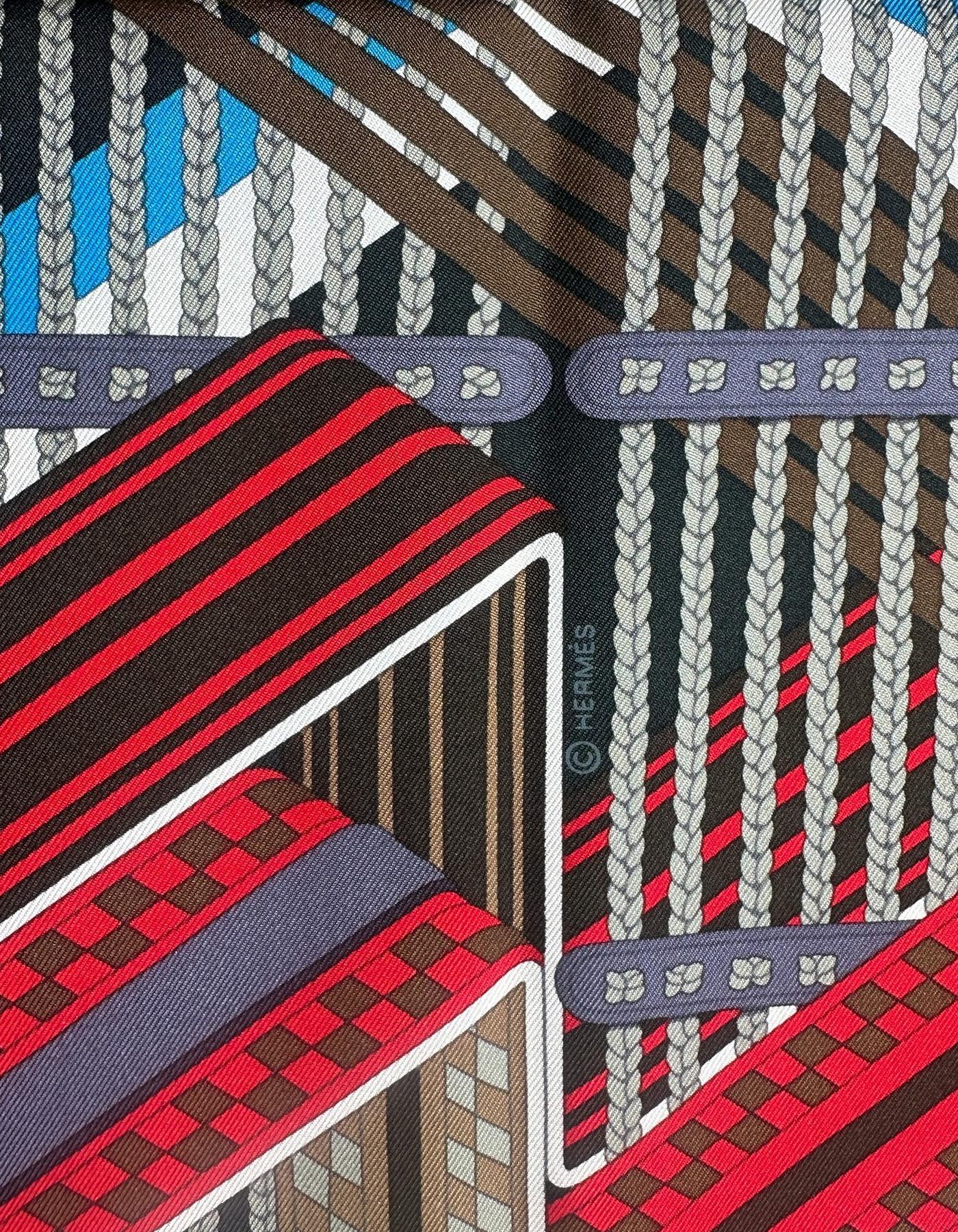 Hermes NEW Marine/ Cobalt/ Noir/ Rouge Double Sangle 90cm Silk Scarf designed by Virginie Jamin

Made In: France
Color: Marine/ Cobalt/ Noir/ Rouge
Materials: 100% Silk
Overall Condition: Excellent, like new
Includes: Hermes tag
Retail: $550 plus