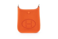 Hermès New Mini Evelyne Neo Orange