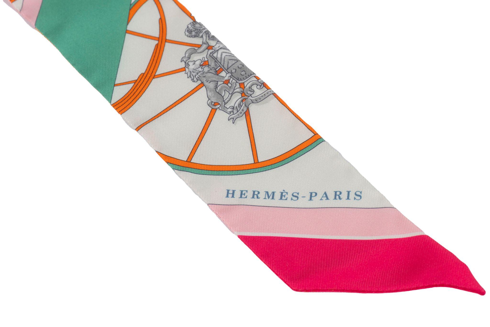 Hermès Twilly silk twill scarf with hardware. Can be worn as a scarf or as a bracelet. Comes with original box.