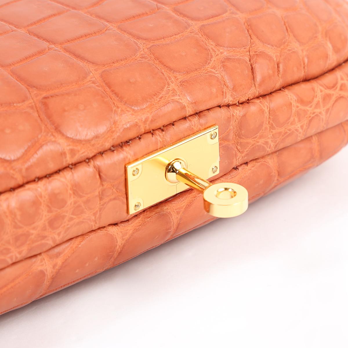 New Condition
Crocodile
Gold Tone Hardware
Measures 13.25