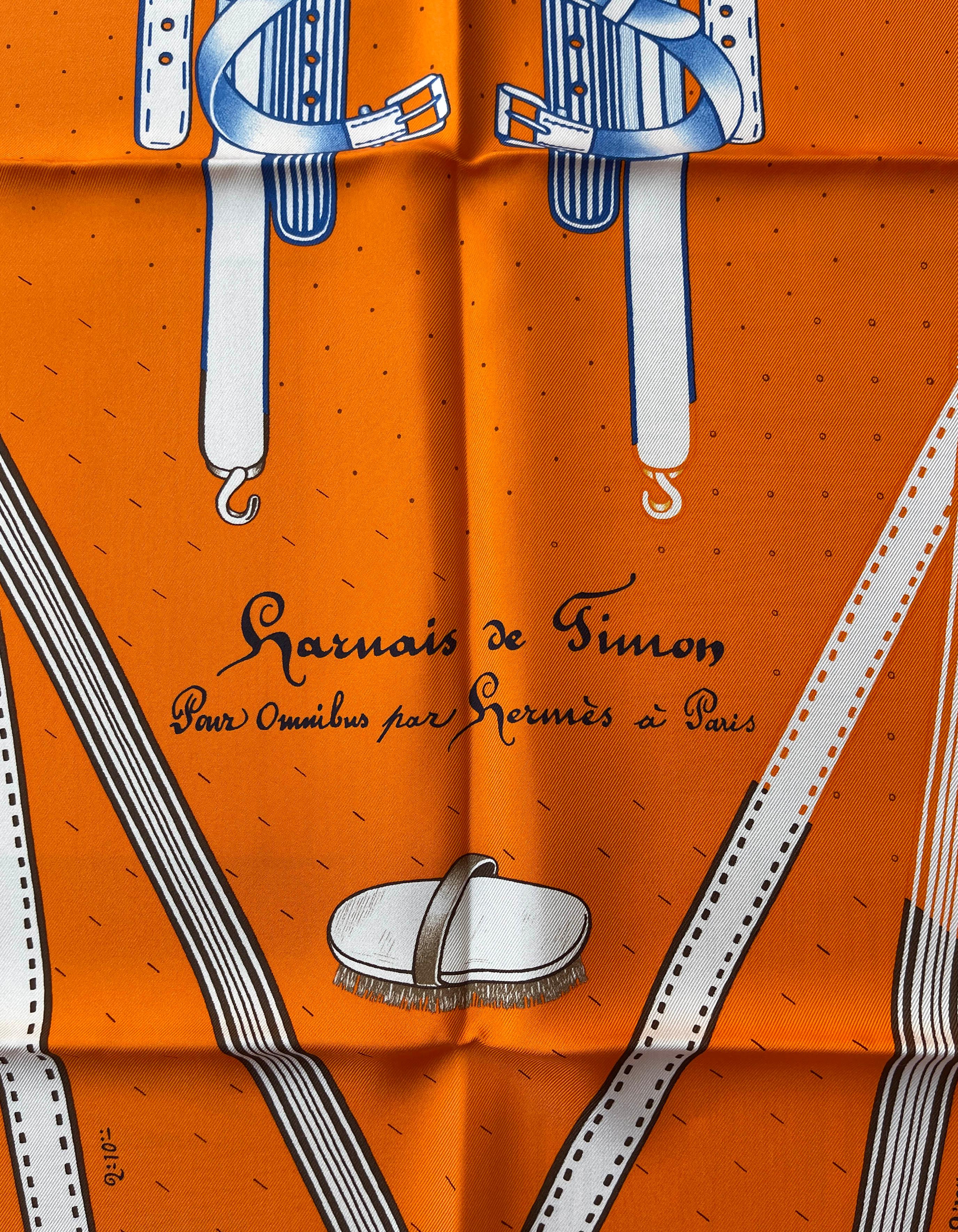 Hermes Orange/Bleu/Bordea Harnais de Timon 90cm Silk Scarf Designed by Florence Manlik. This item was purchased at a Hermes sale and the Hermes tag is stamped with an 