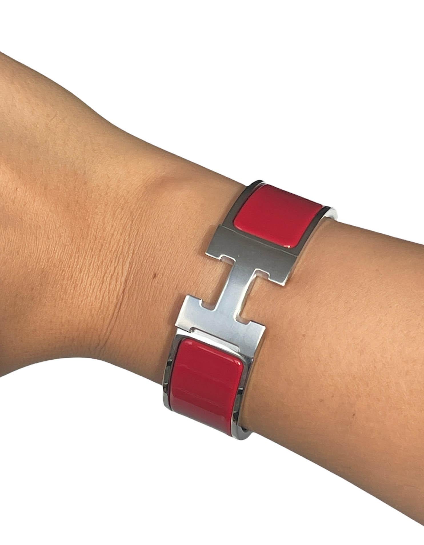 Hermes Palladium/ Rouge H Red Wide H Enamel Clic Clac Bracelet sz PM

Made In: France
Year of Production: 2021
Color: Rouge H red, silver, 
Materials: Palladium plated metal, enamel
Hallmarks: 