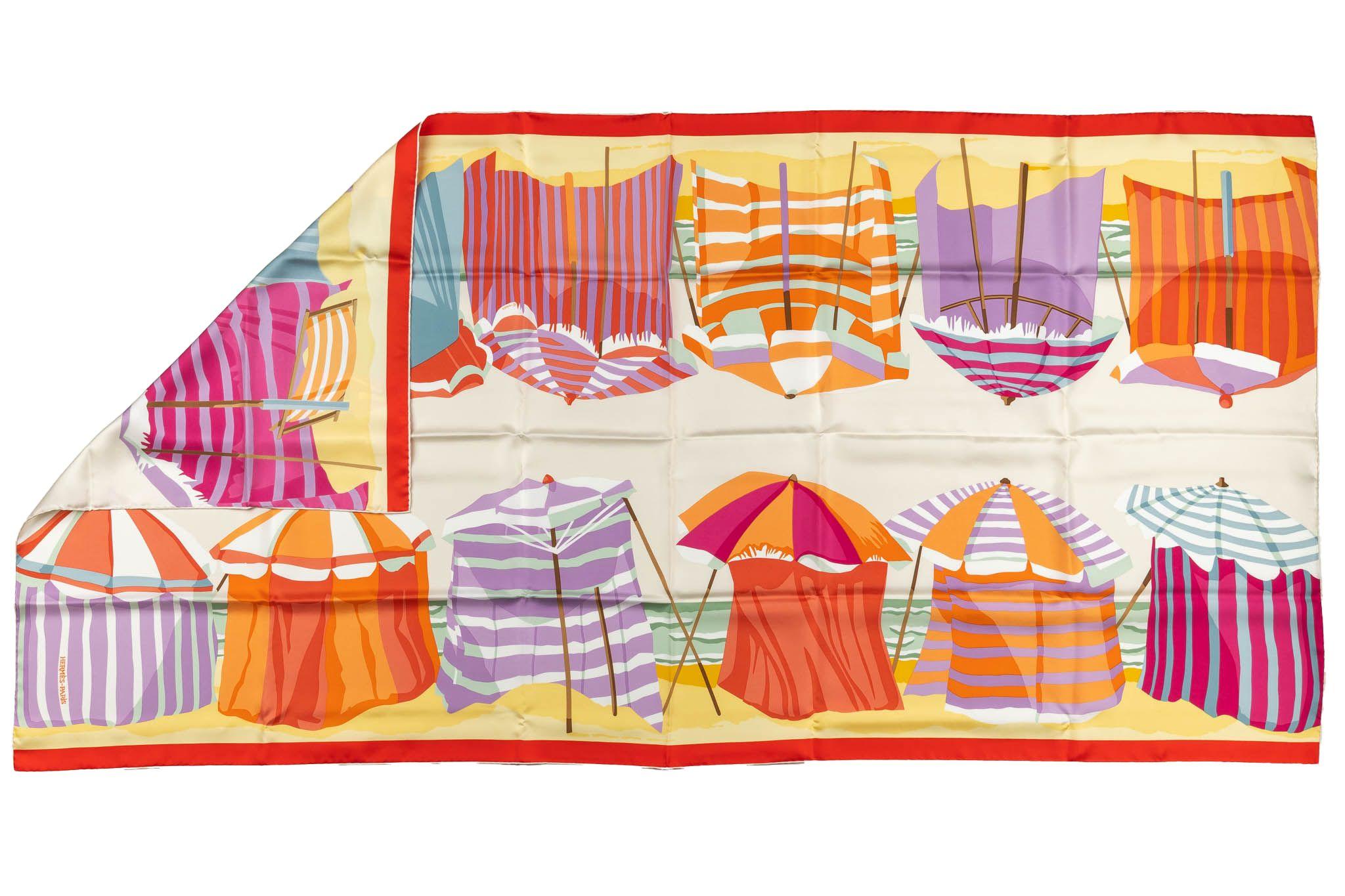 Hermès new rectangular silk shawl , hand rolled edges.  Colorful beach huts design, comes with original box in unworn condition.