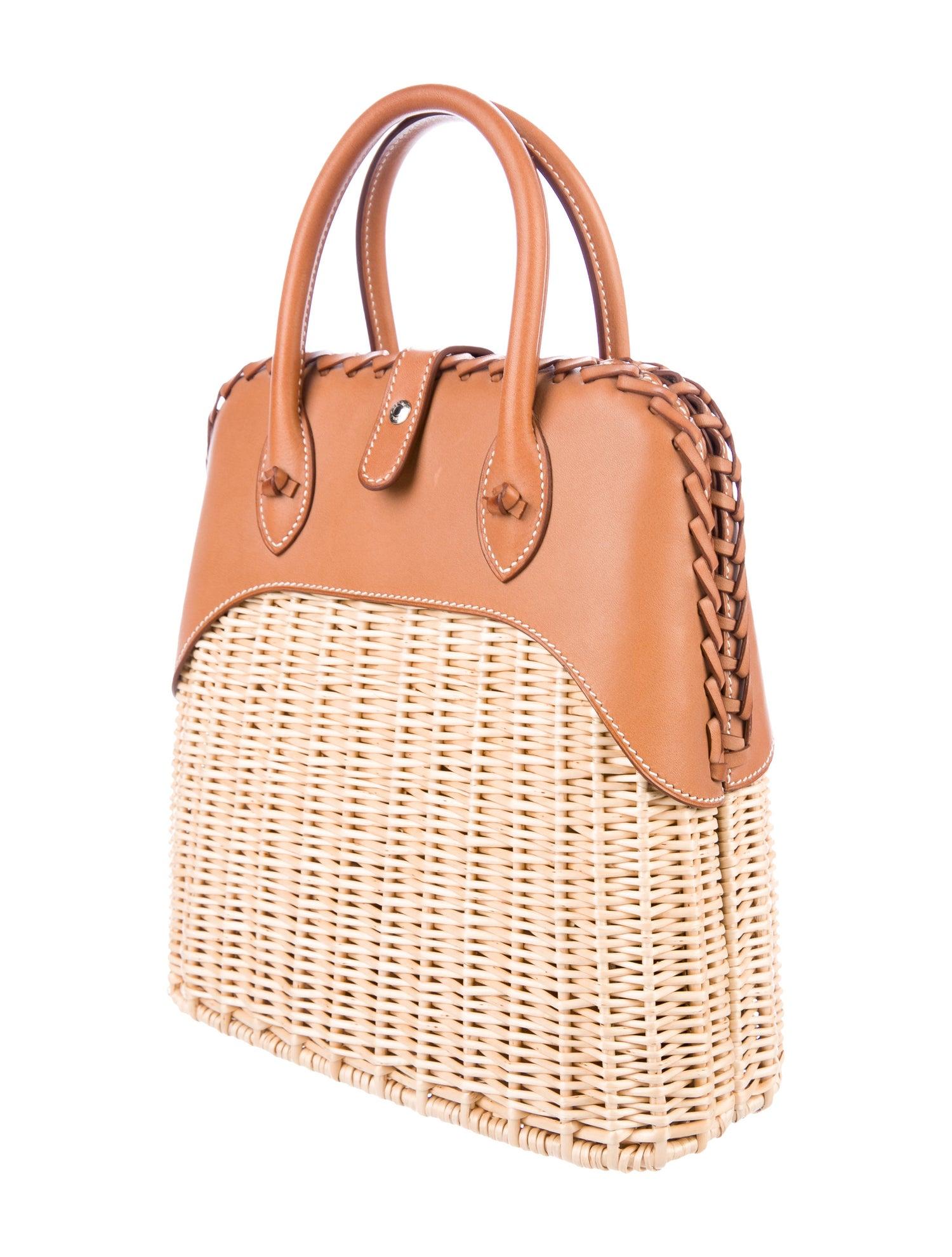 Hermes NEW Tan Wicker Basket Cognac Leather Bolide Top Handle Satchel Bag with Dust Bag & Box

Wicker
Leather
Palladium plated hardware
Leather lining
Snap closure
Made in France
Handle drop 3.25