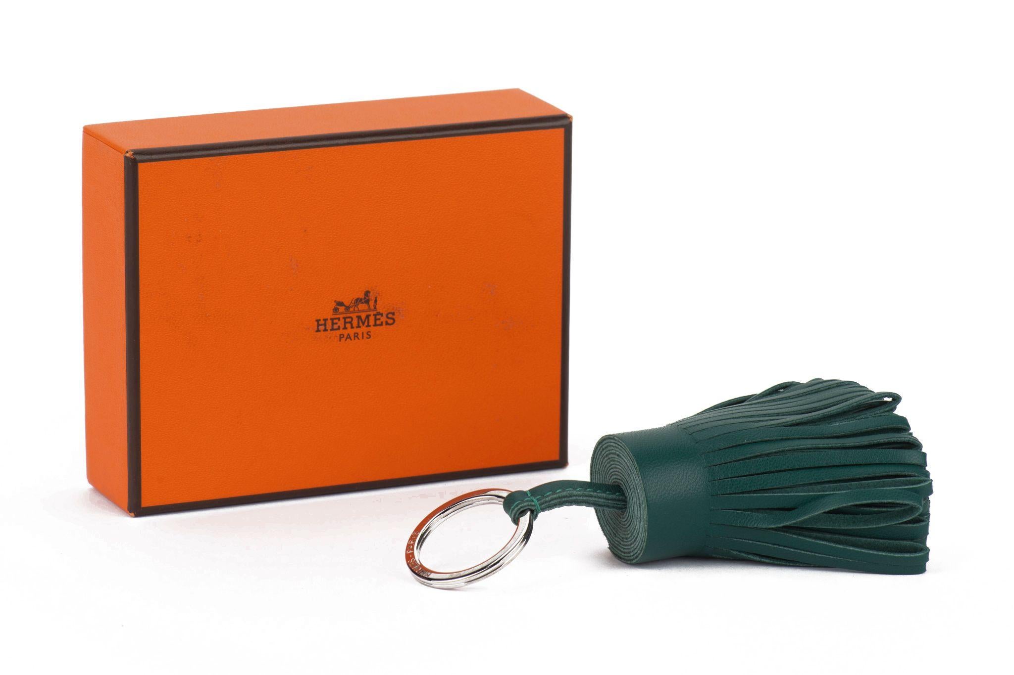 Hermès vert cypress lambskin leather Carmen tassel keychain. Brand new with original box in unused condition.