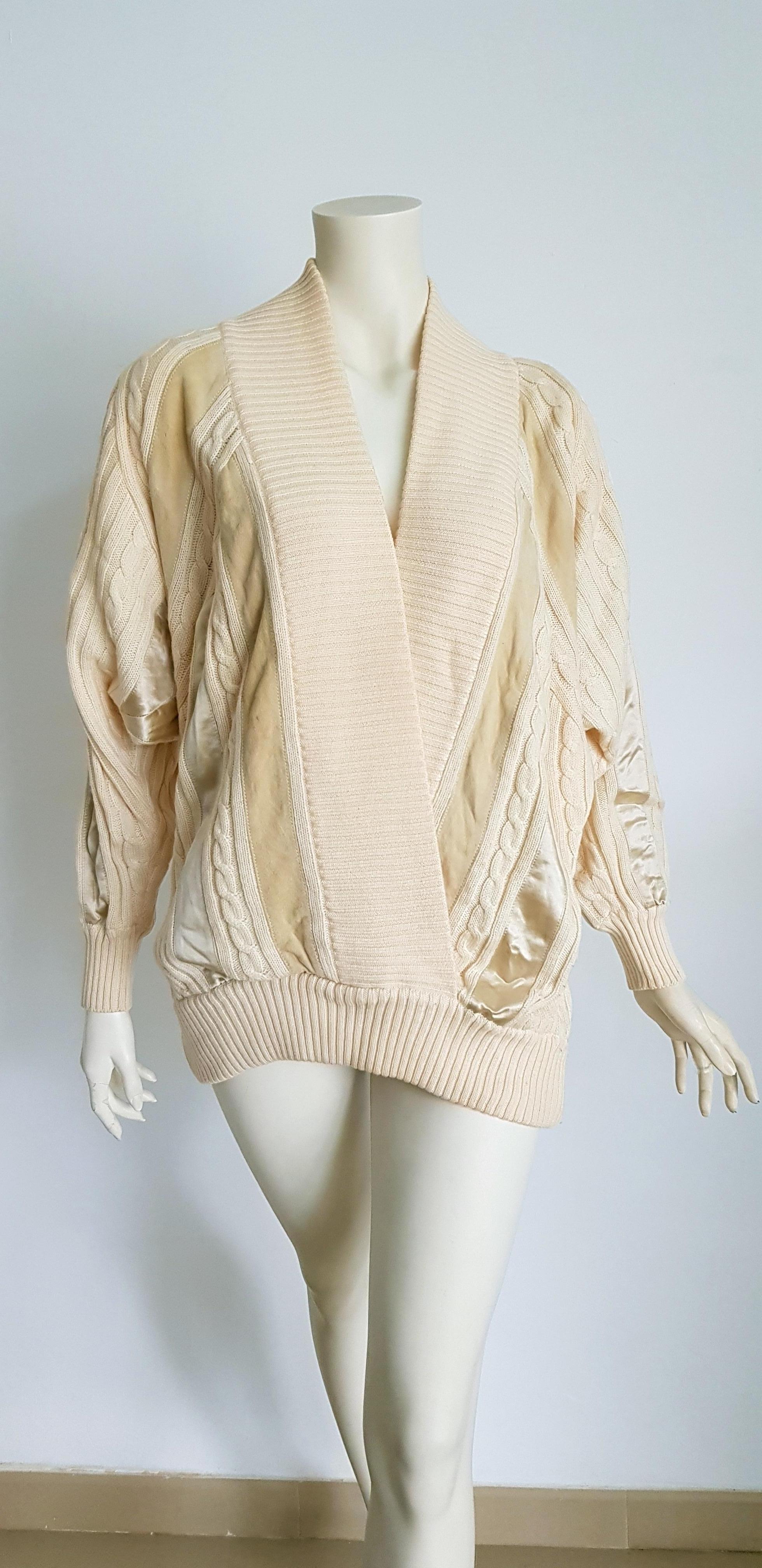 HERMES white cream wool collection sweater with silk suede strips - Unworn, New.

SIZE: equivalent to about Small / Medium, please review approx measurements as follows in cm: lenght 79, chest underarm to underarm 60, bust circumference 120, sleeve