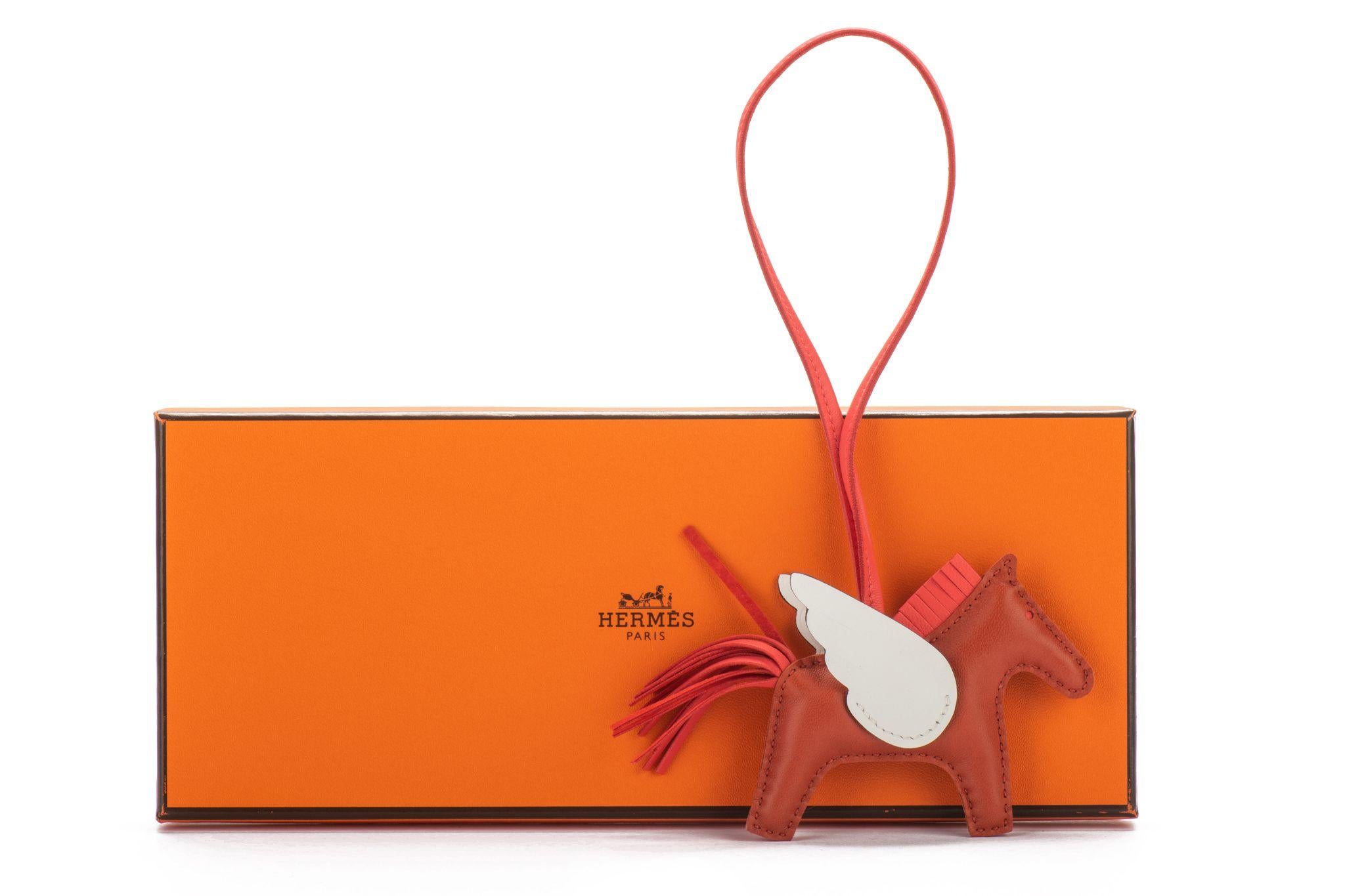 Hermes new grigri rodeo Pegase bag charm. Cui, nata and orange. Date stamp U for 2022. Comes with original box.